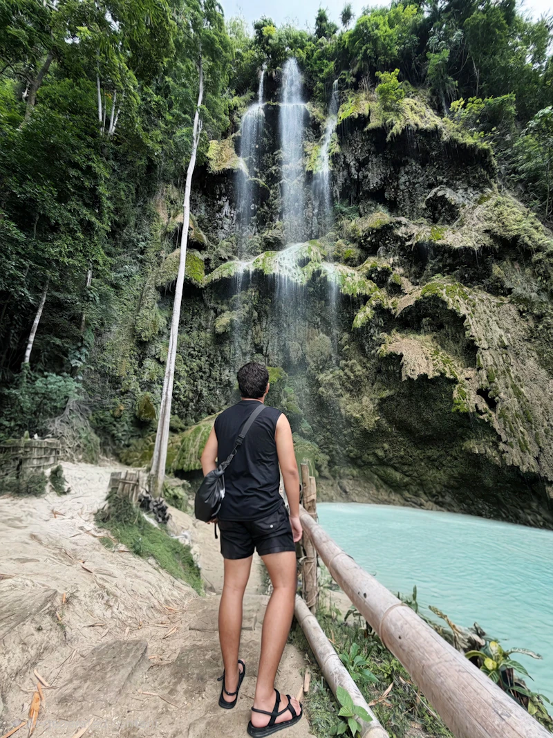 Tumalog Falls cascading into a turquoise pool in Oslob, Cebu