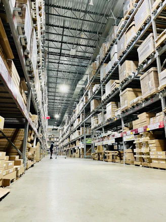 Logistics professional inspecting inventory for contract fulfillment and delivery