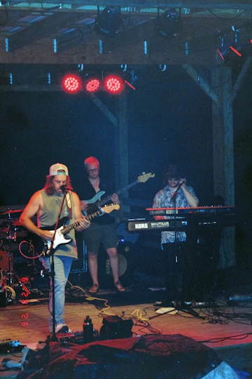 Live band performing under stage lights