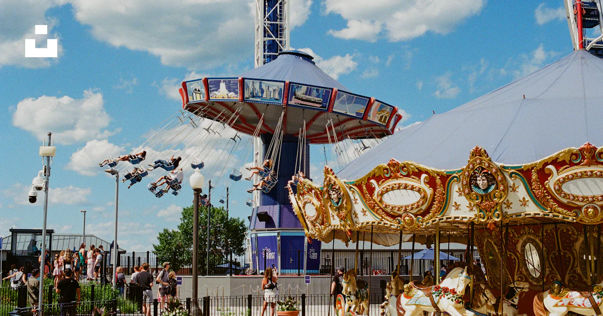 High Drop Swing Ride Carousel, swing ride, and drop tower at an amusement park. photo – Free ...