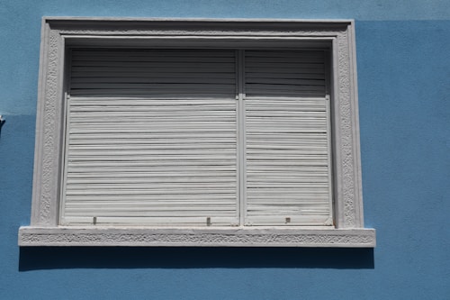 Motorised security roller shutter