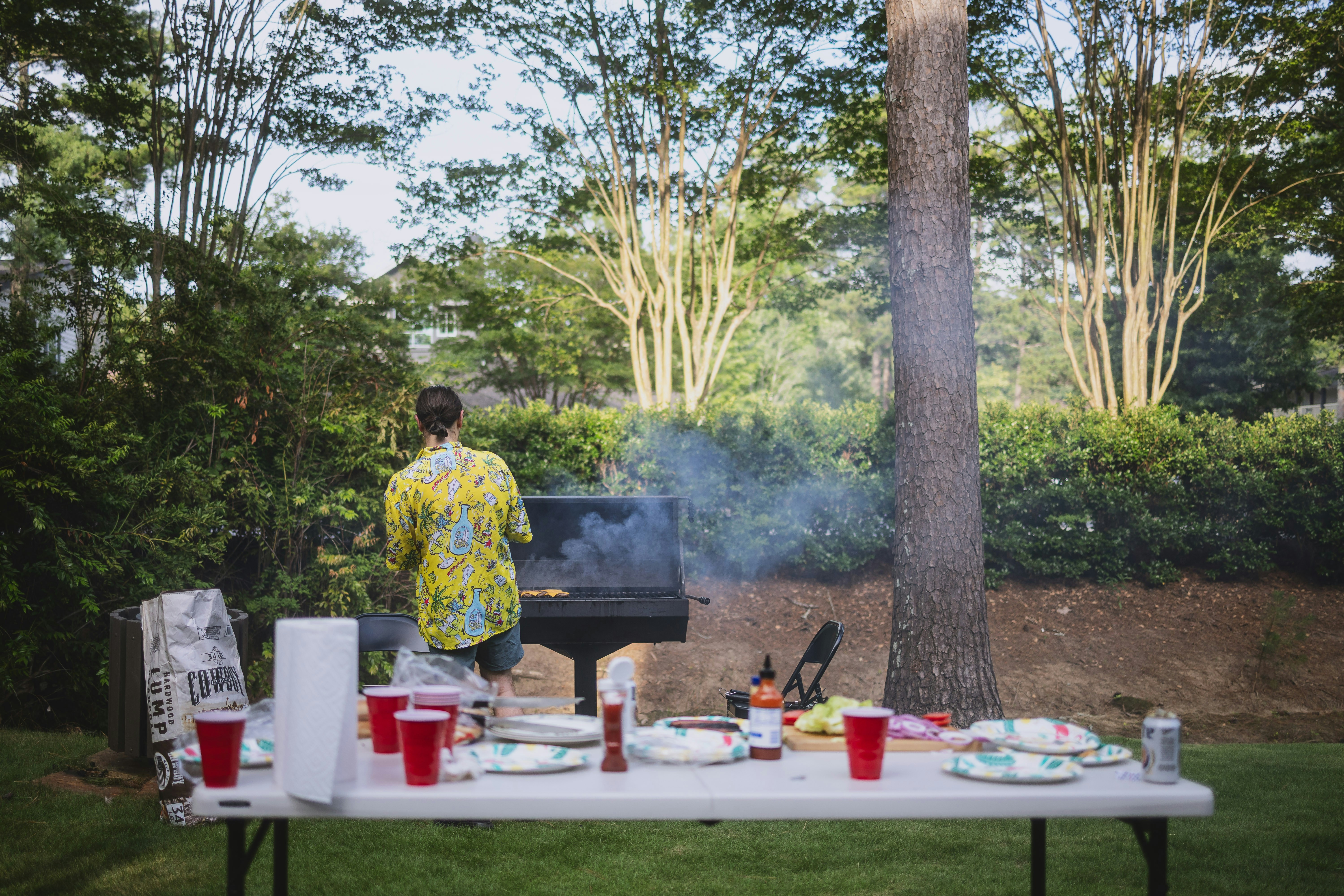A backyard barbecue at golden hour