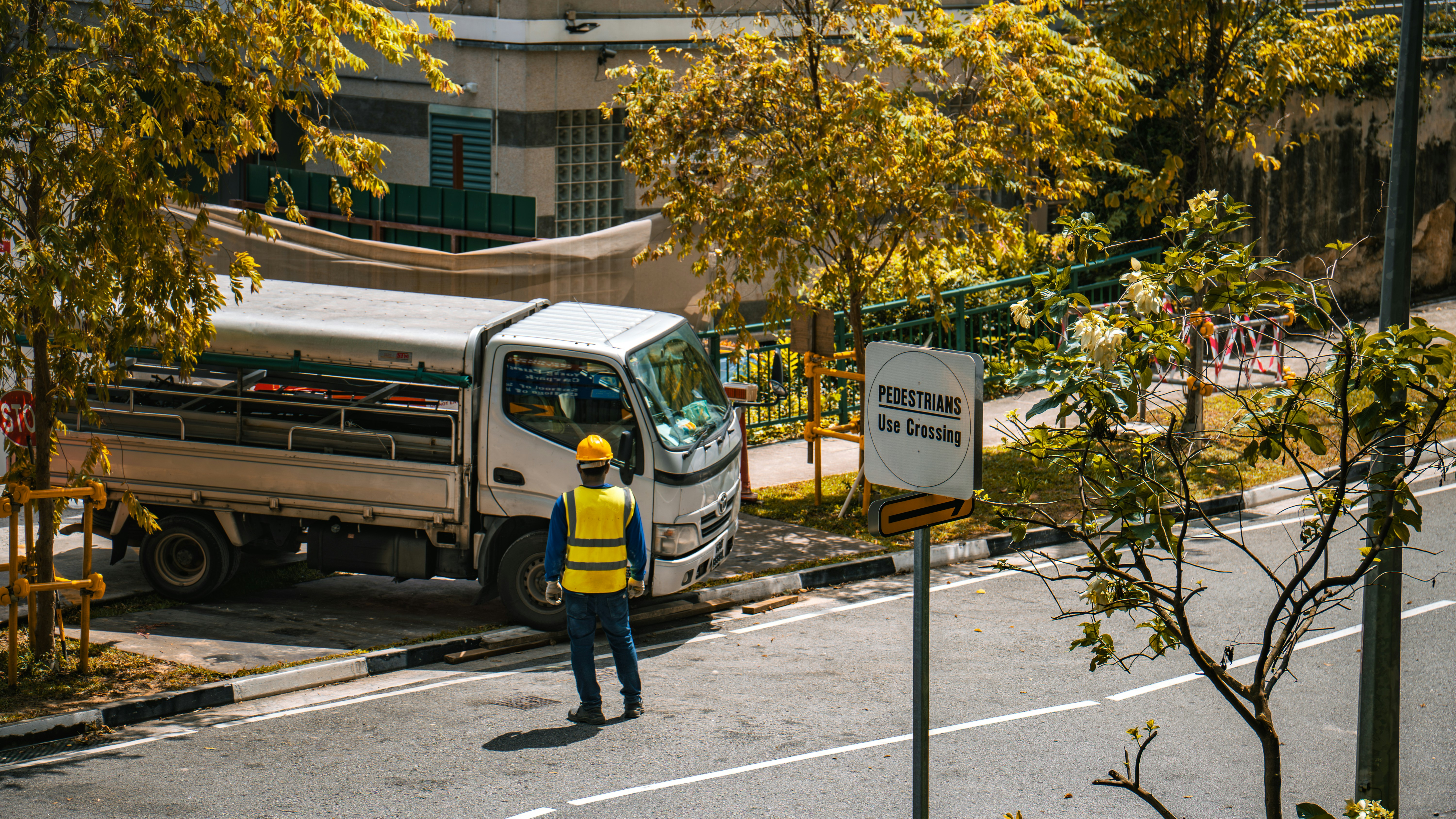 Worker in a high-vis vest at a regional worksite