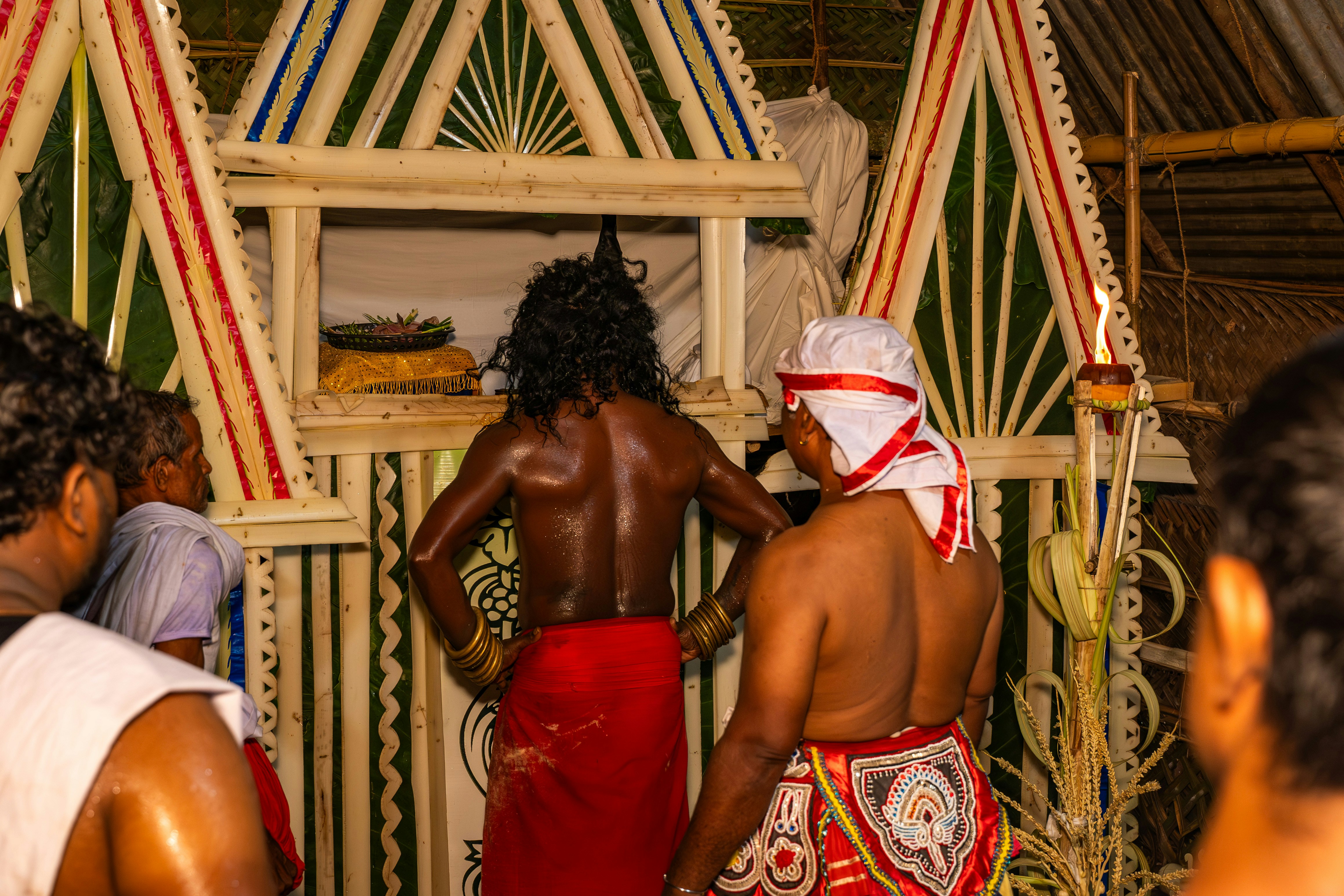 Indigenous people sharing traditional knowledge and cultural practices with visitors
