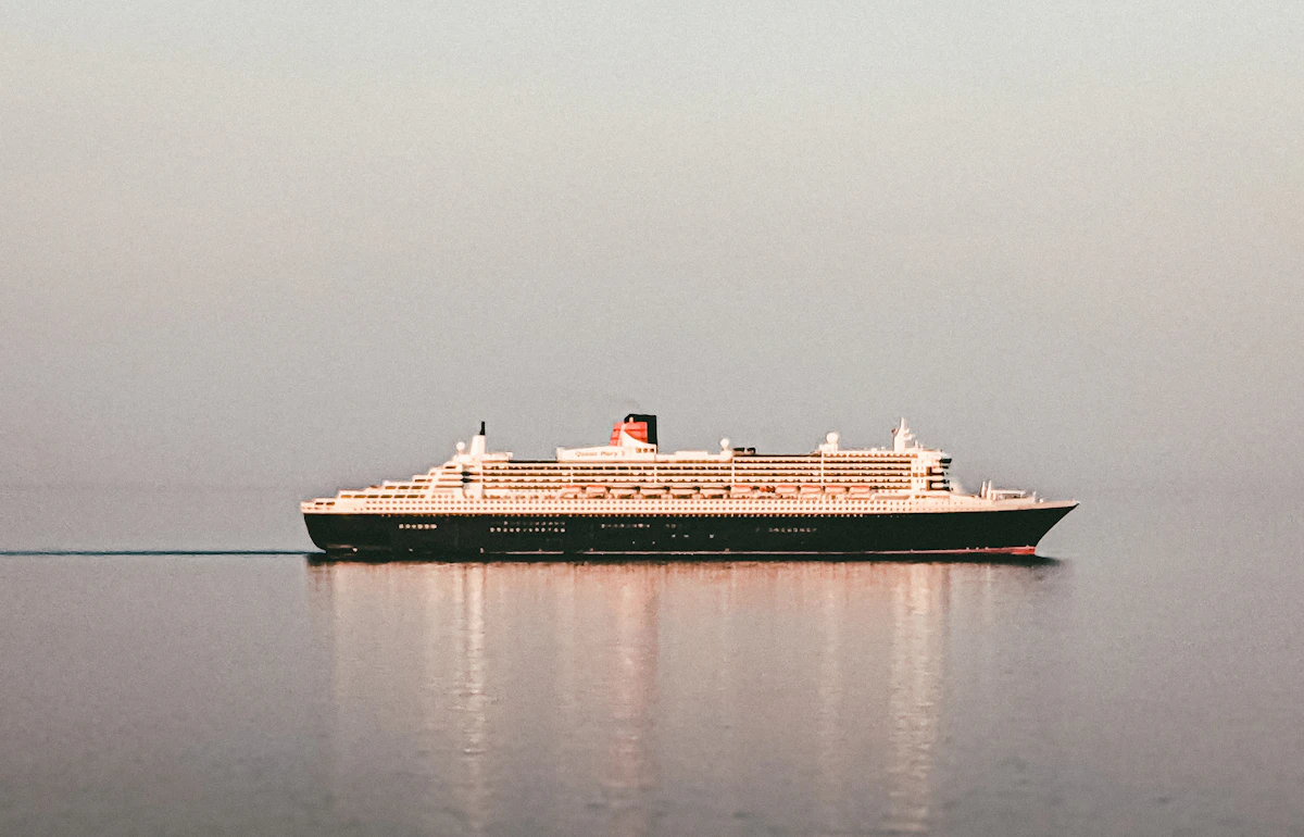 A large cruise ship sailing on calm water