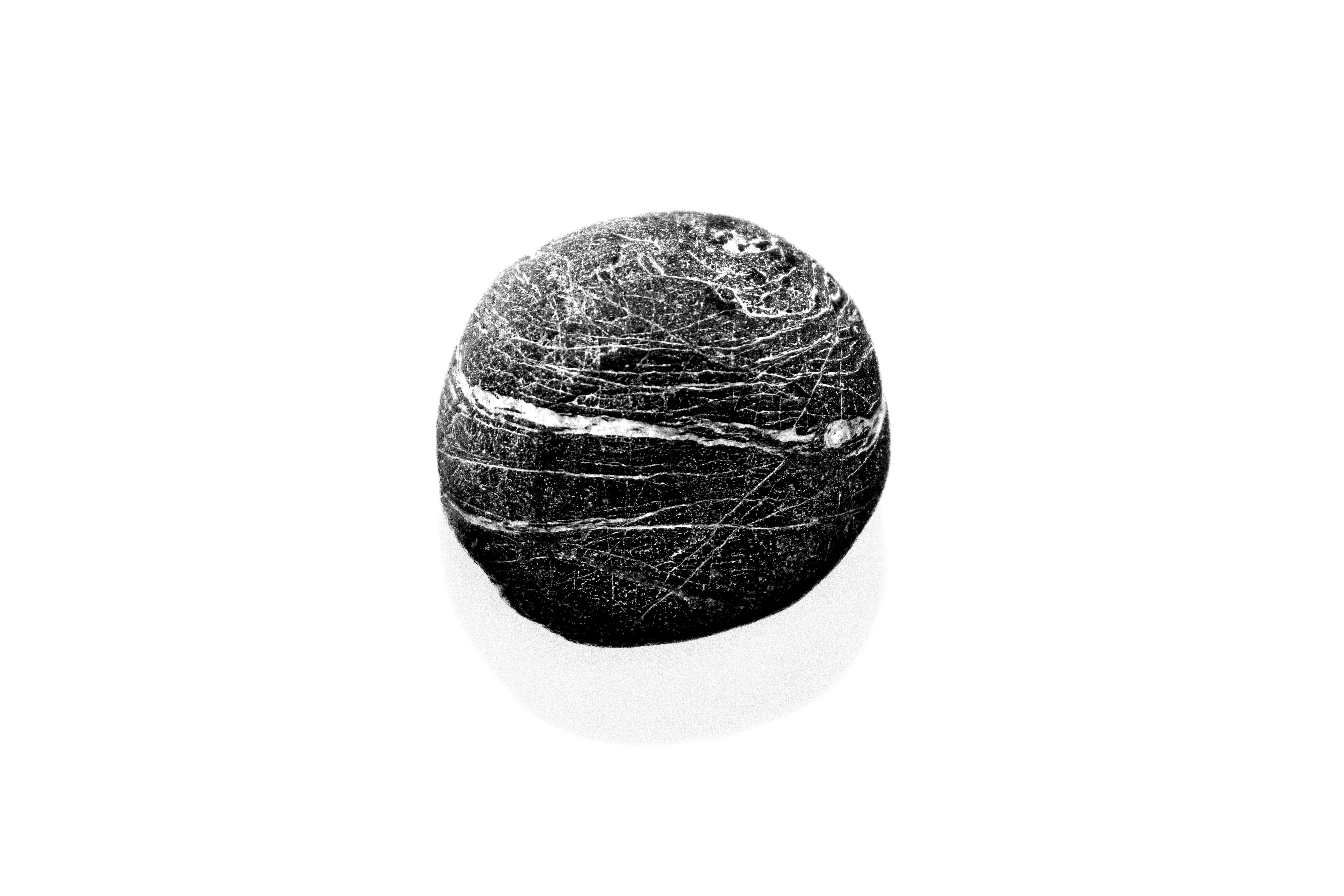 Abstract Round Textured Dark Stone With A White Stripe. 4K Wallpaper #2523