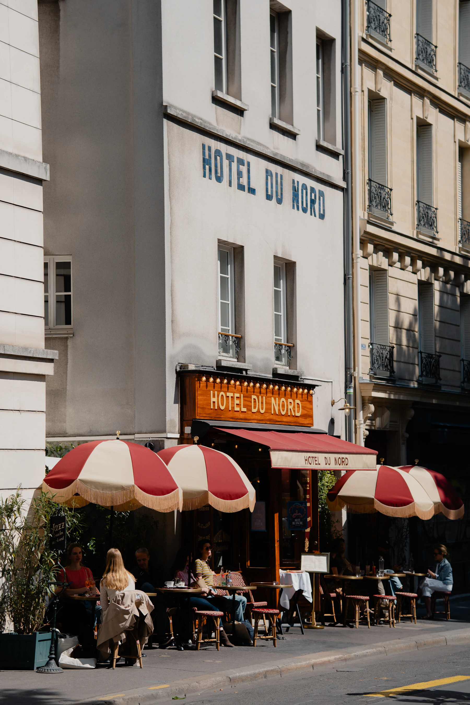 Illustrative travel photograph for this guide: Canal Saint-Martin Paris cafe terrace