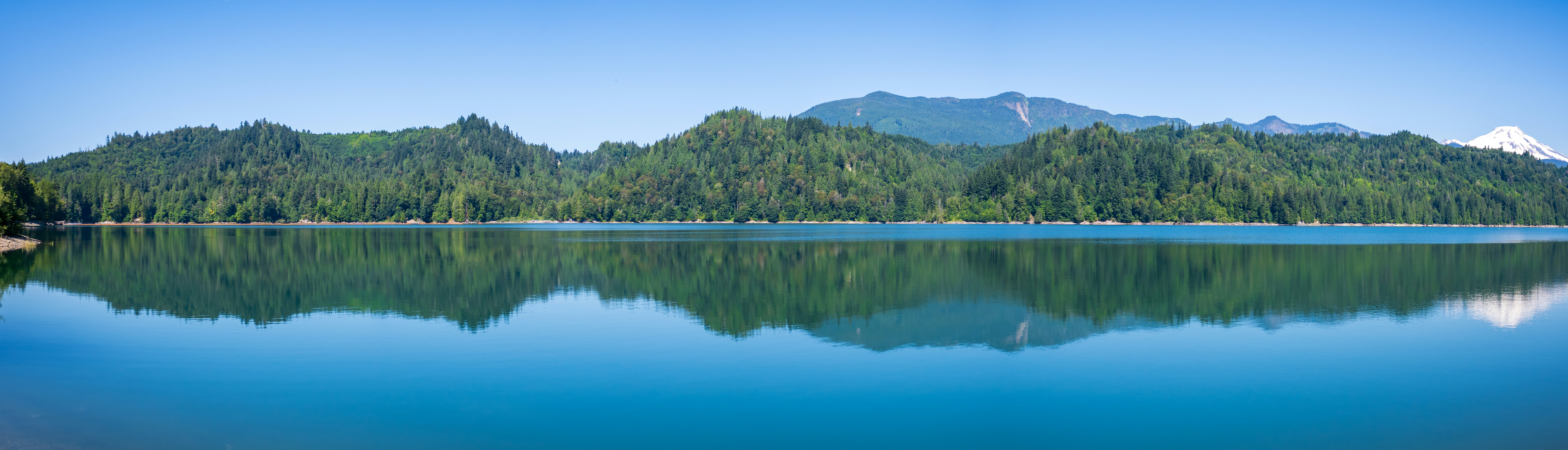 Nature A Serene Lake Reflecting Forested Mountains Under A Clear Sky. 4K Wallpaper #2498