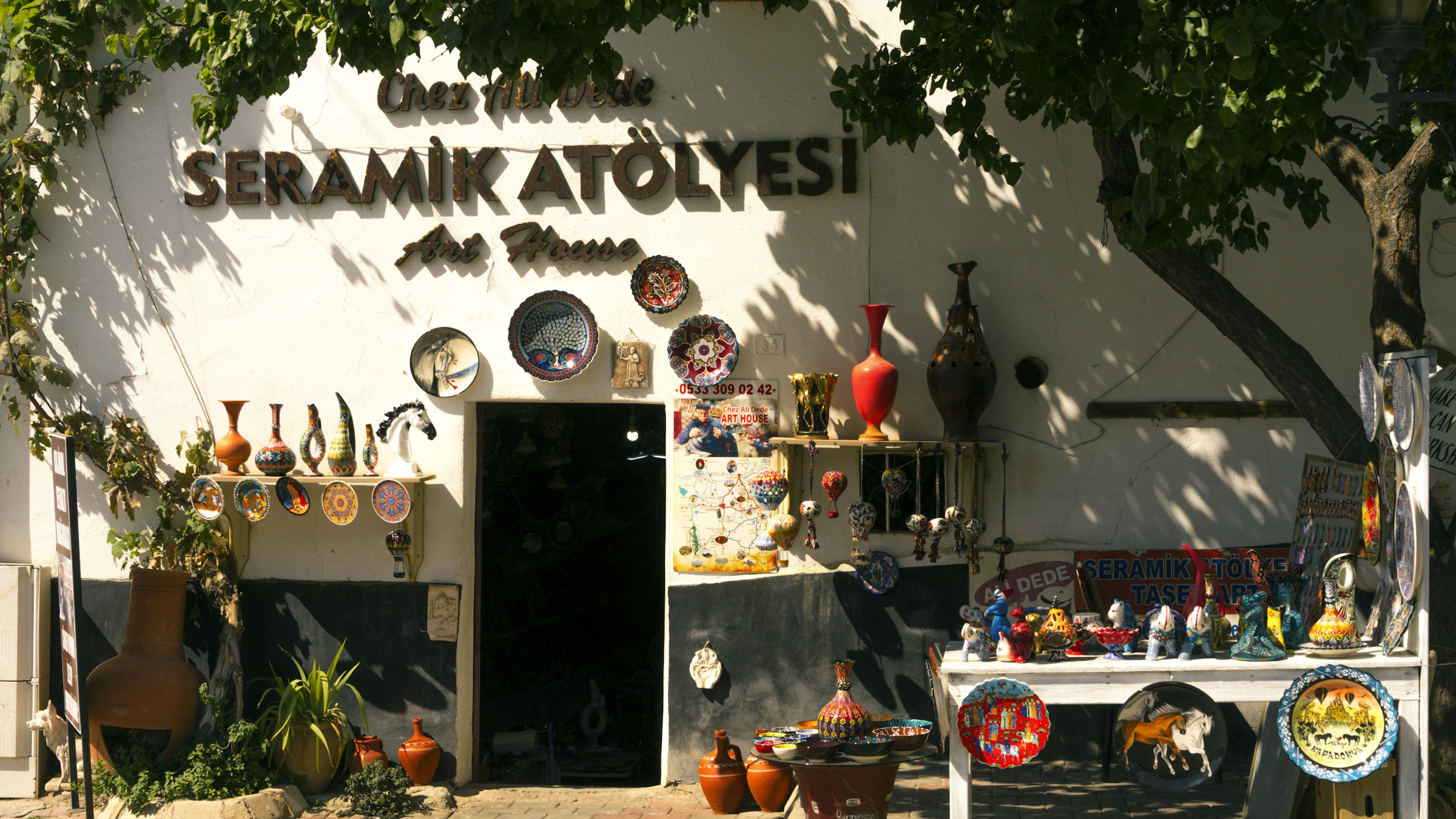 Traditional ceramic workshop filled with handcrafted pottery