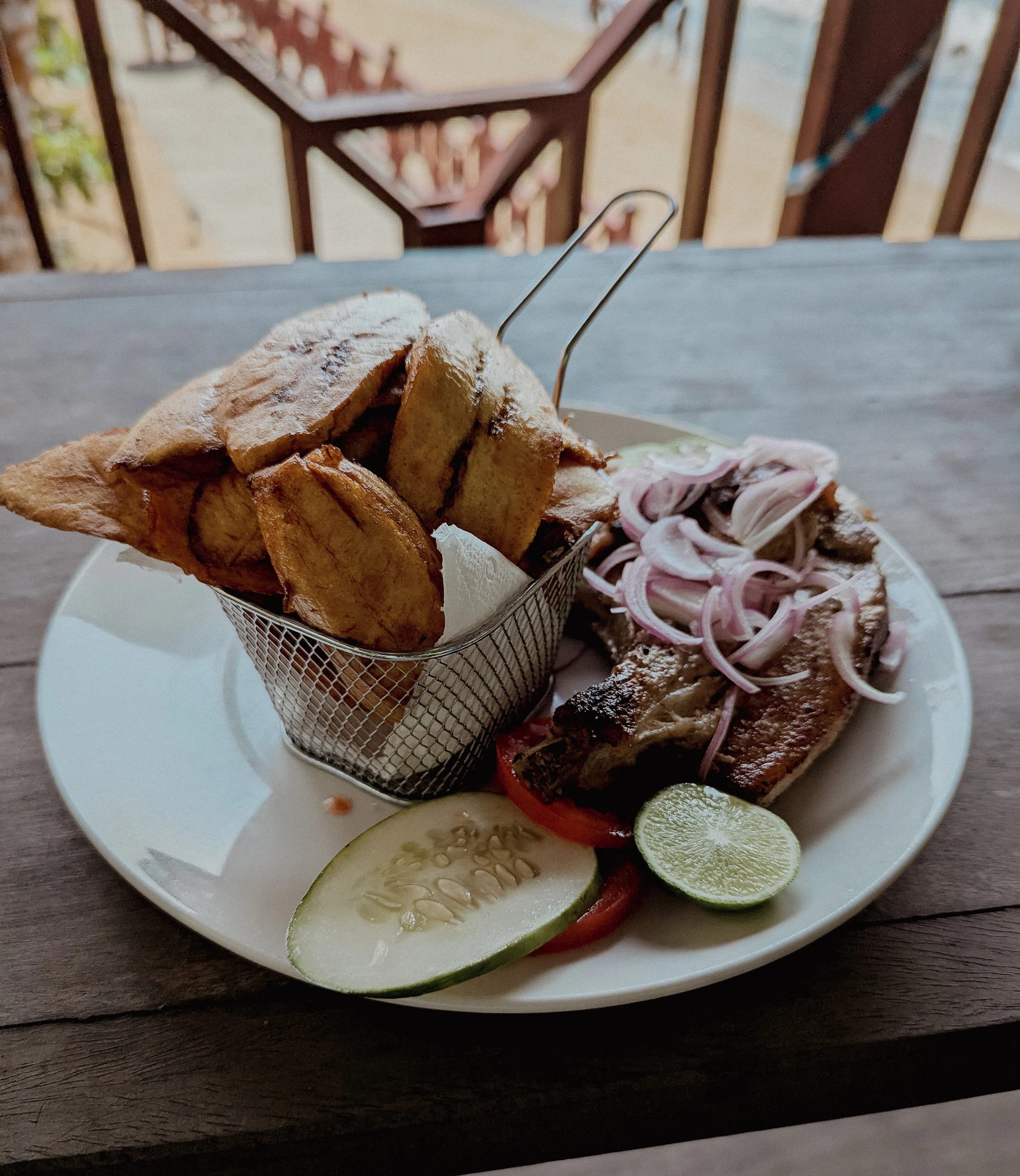 Grilled fish with fried plantains