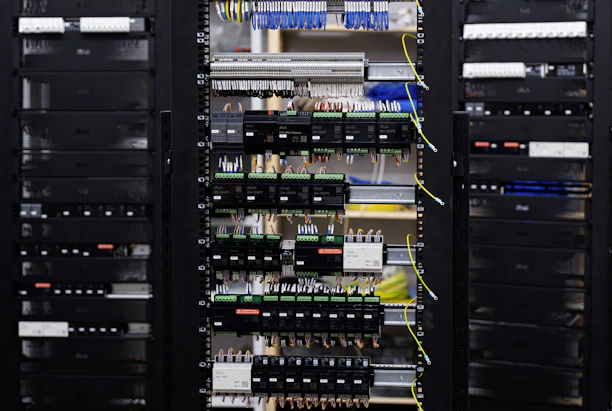 Power distribution and control equipment in a modern infrastructure cabinet