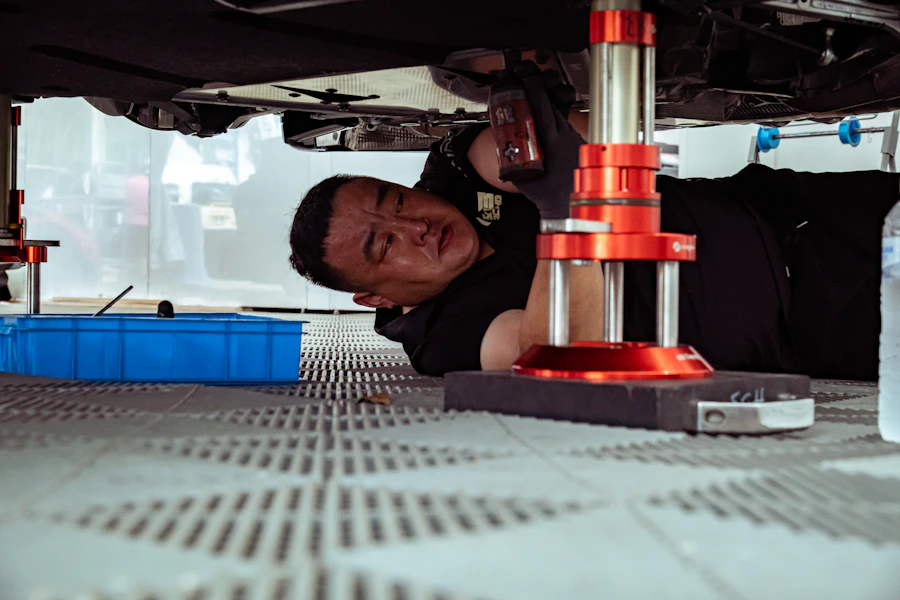 Automotive technician repairing a vehicle