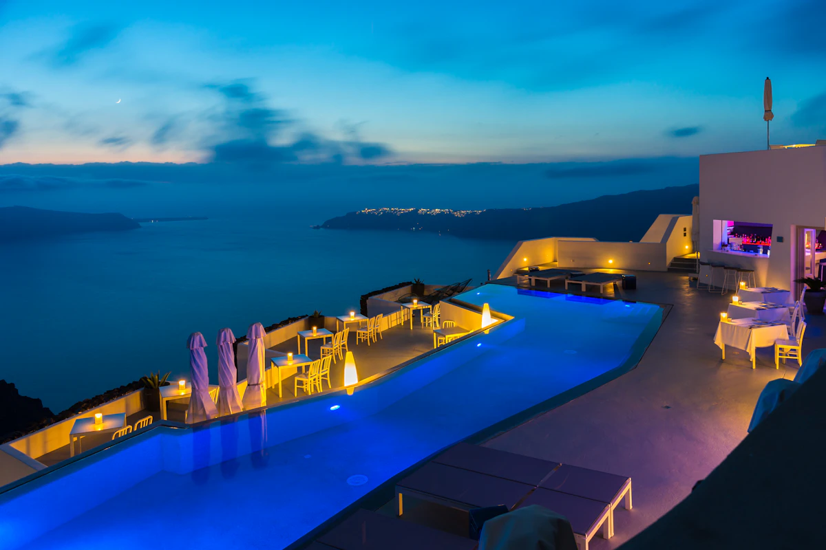Elegant cliffside infinity pool at twilight
