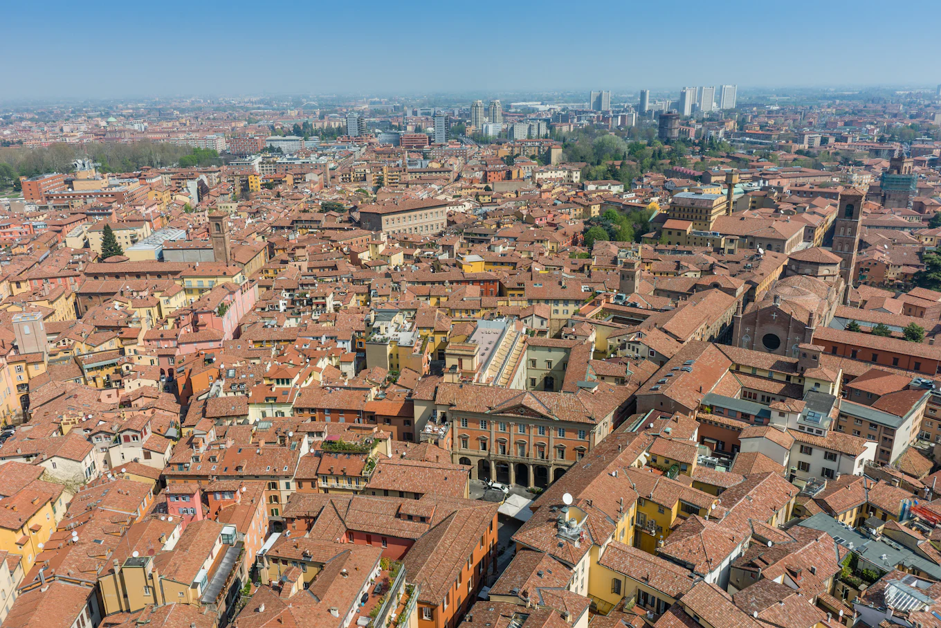 Bologna from above, terracotta roofs to the horizon