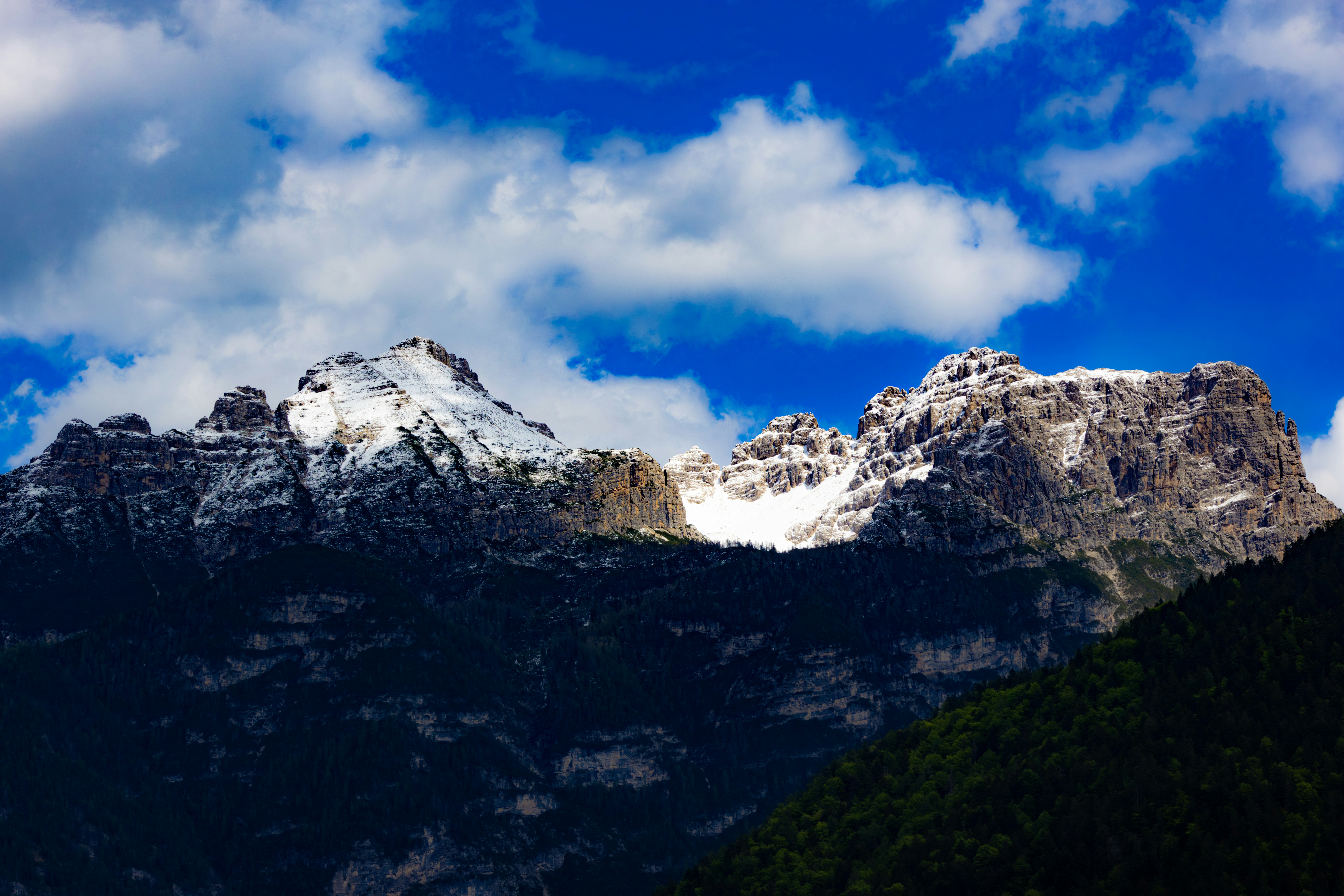 Mountains Snow Capped Mountains Under A Bright Blue, Cloudy Sky. 4K Wallpaper #3568