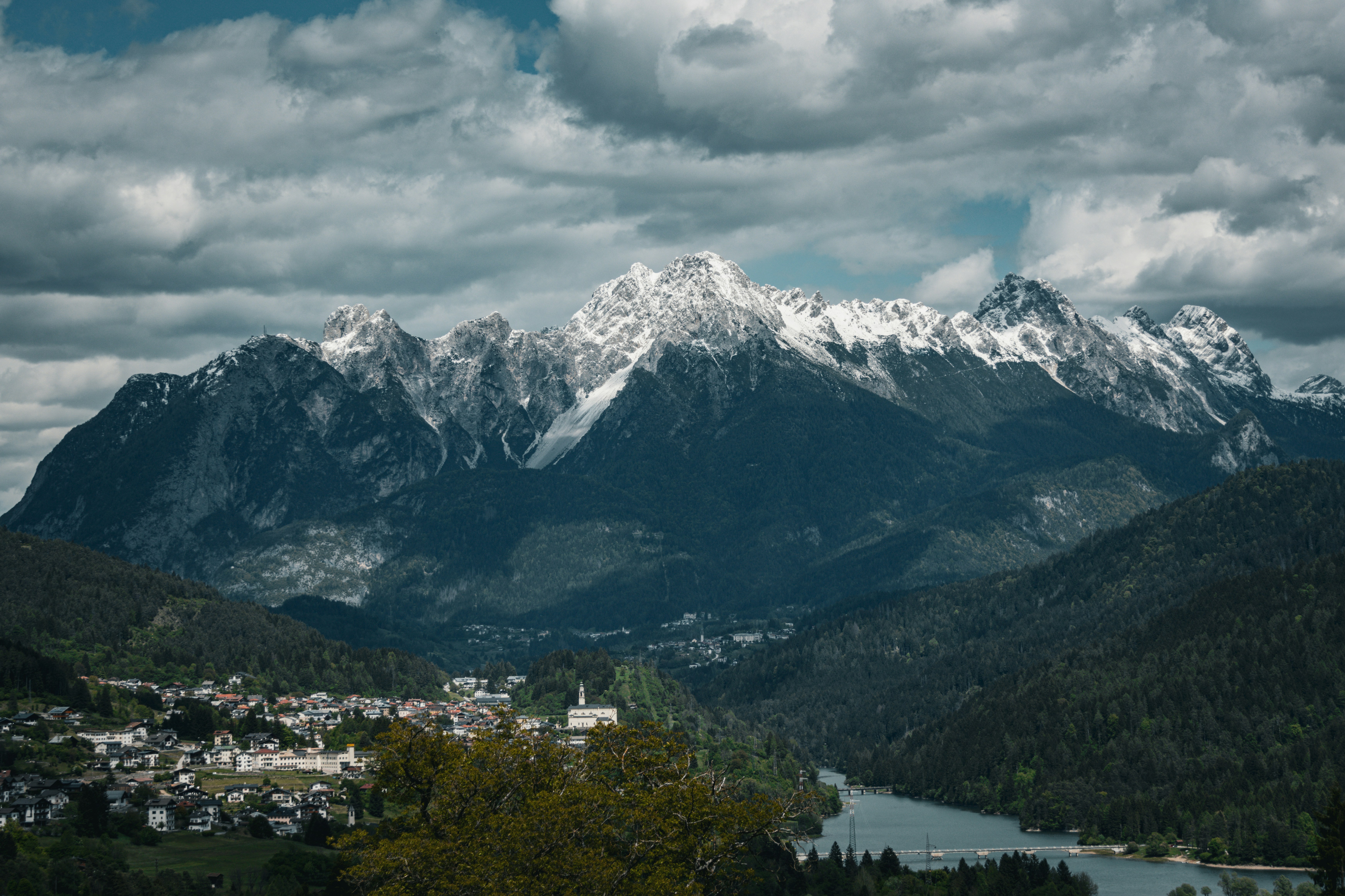 Mountains Majestic Snow Capped Mountains Above A Valley Town And River. 4K Wallpaper #3581