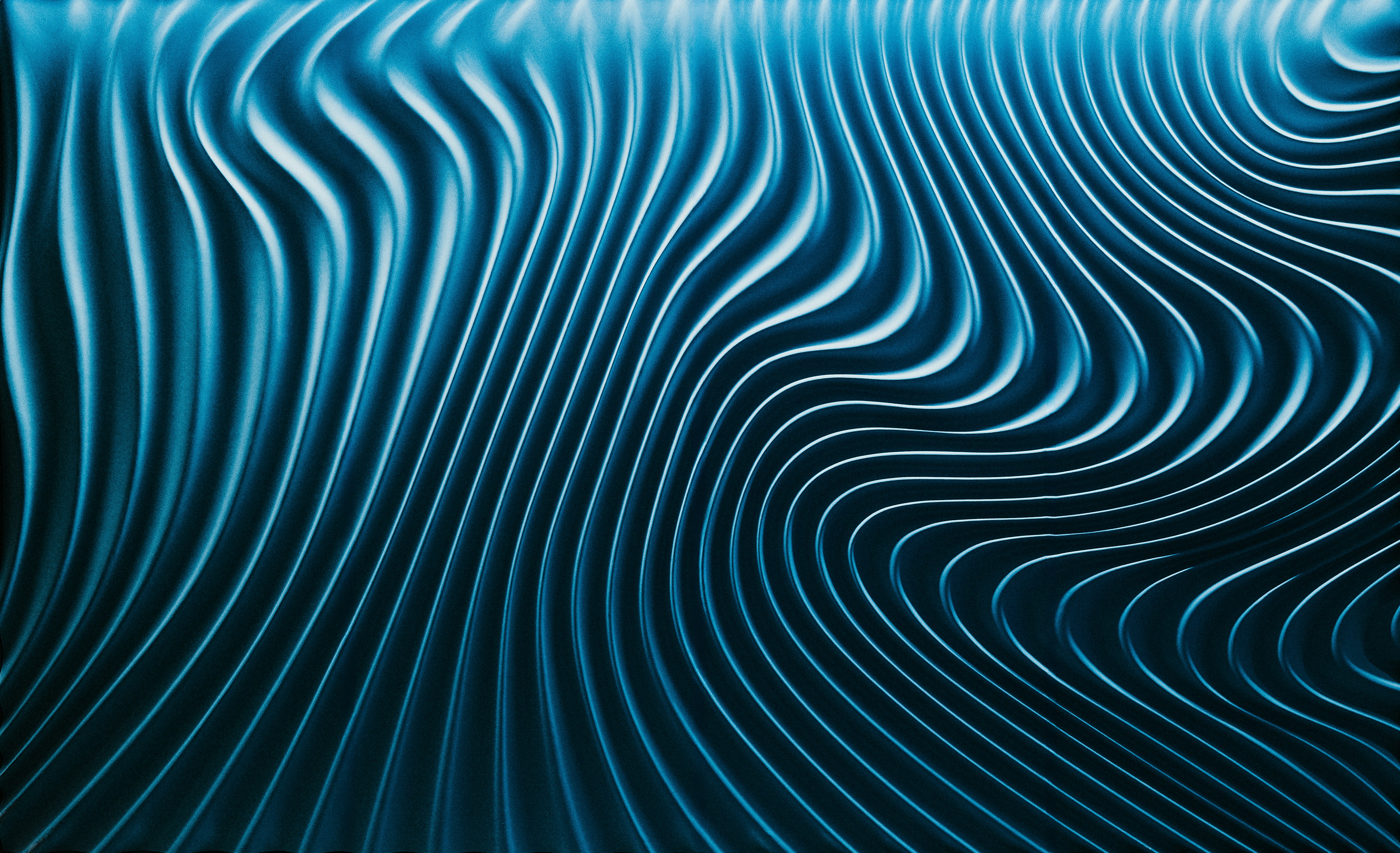 Wavy blue lines creating an abstract pattern