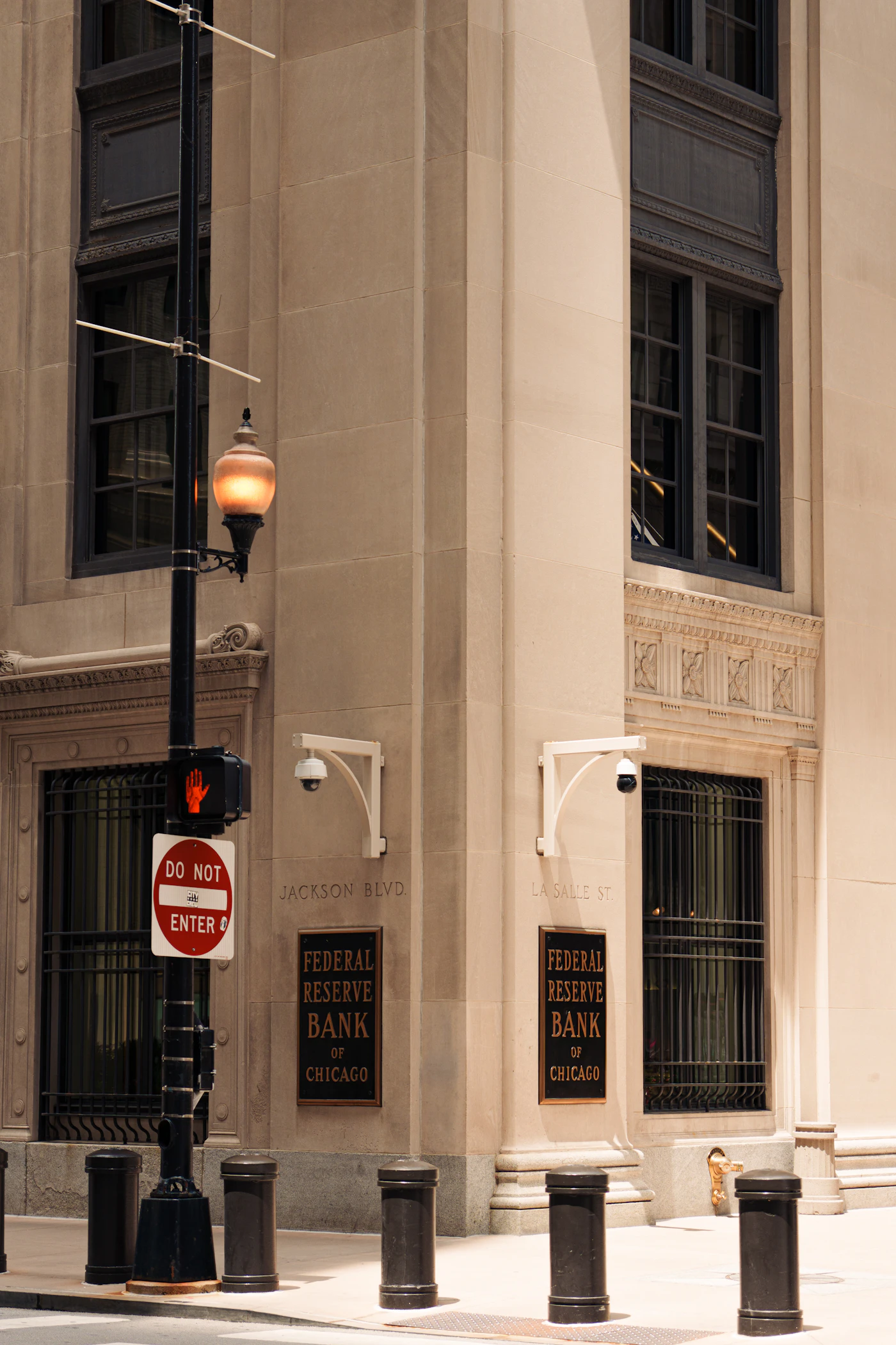 Corner of the Federal Reserve Bank of Chicago and its bronze plaques