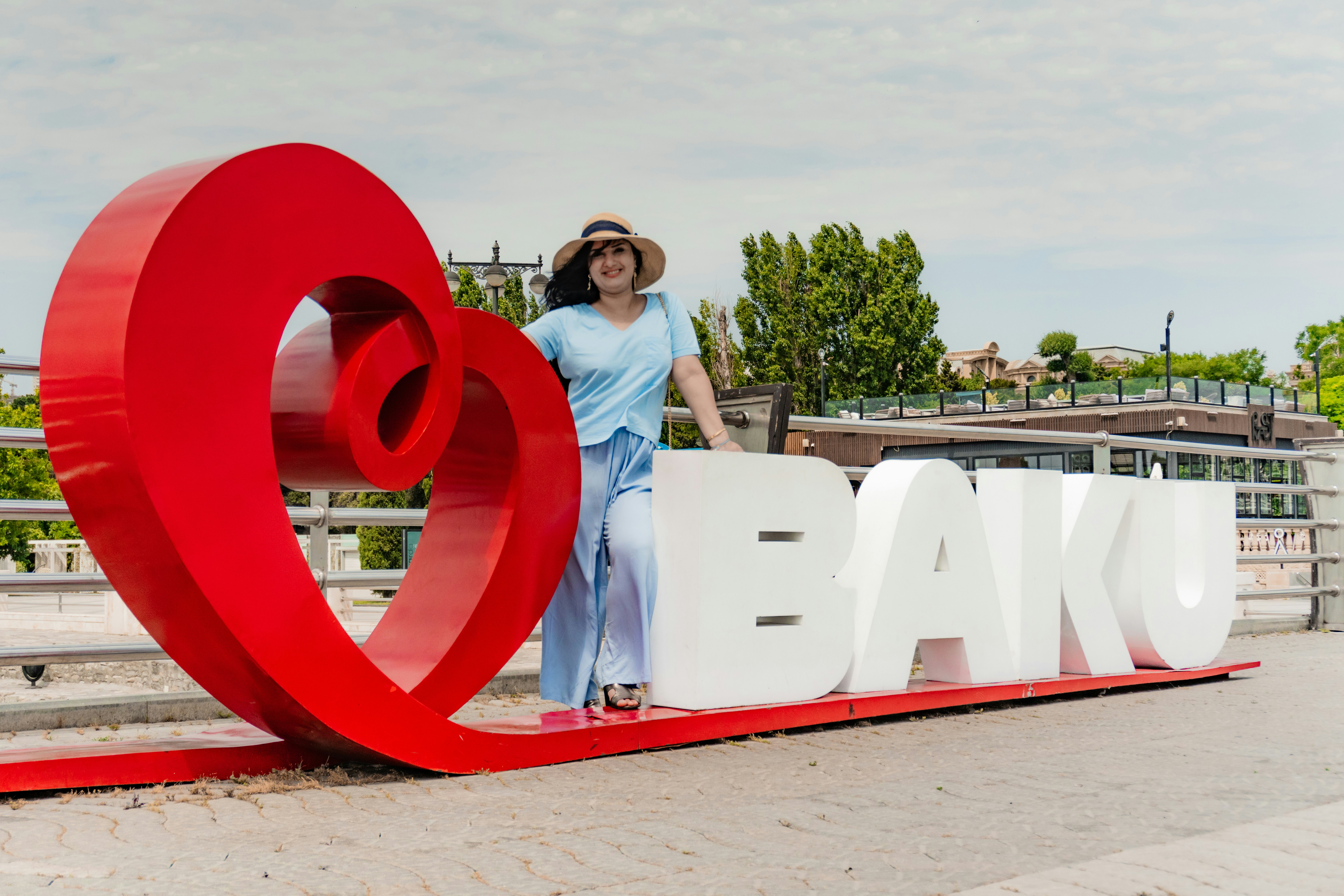 Woman with a large red heart and \
