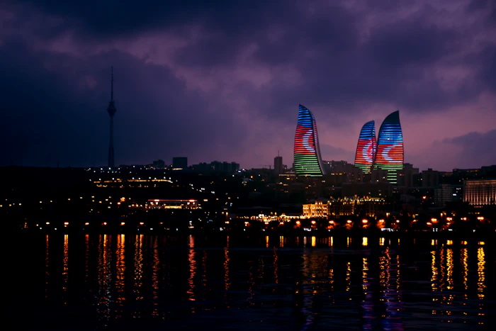 Flame Towers glowing over Baku at night
