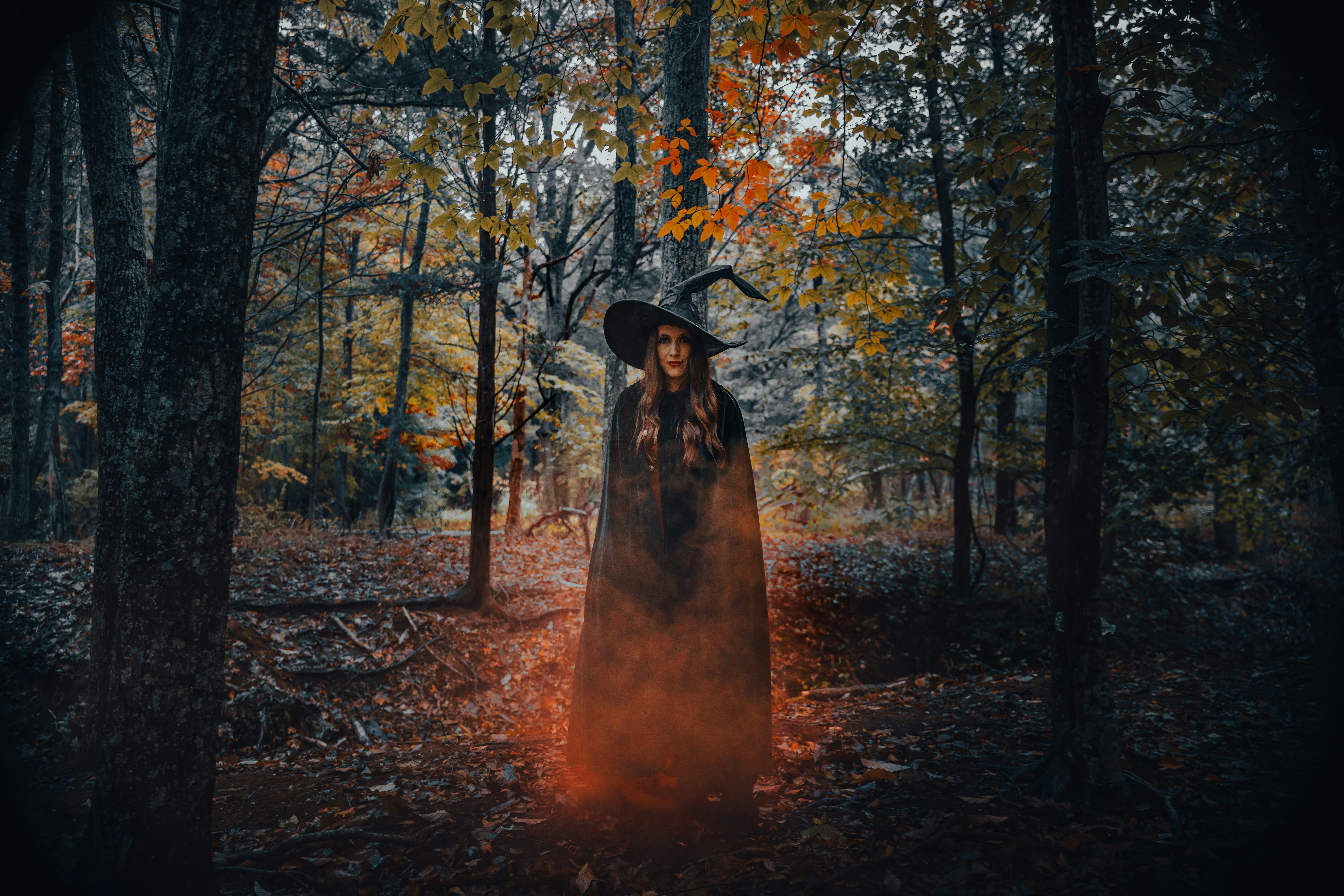 Dark A Witch In A Dark Forest With An Orange Glow. 4K Wallpaper #3615