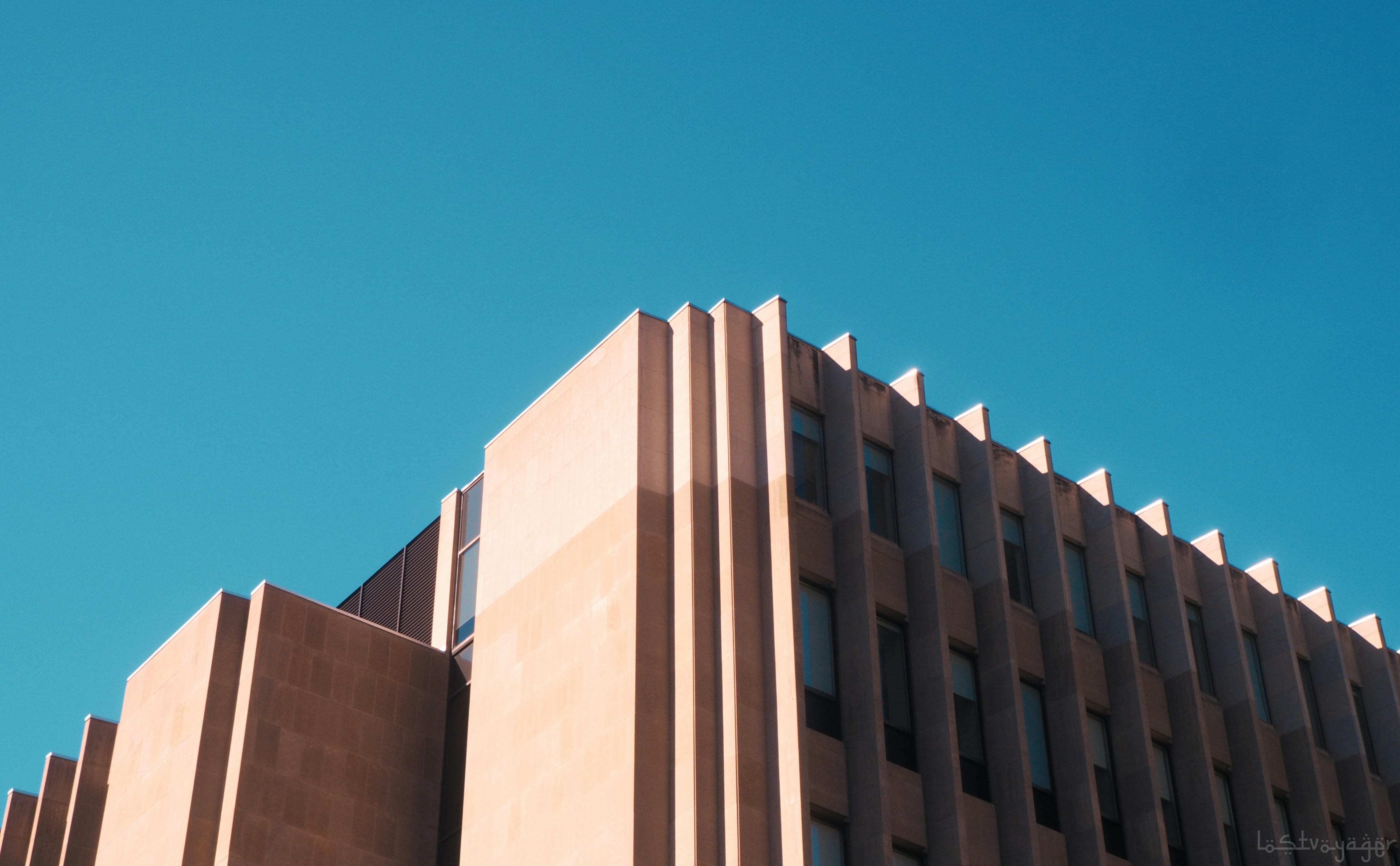 Building facade against a clear sky