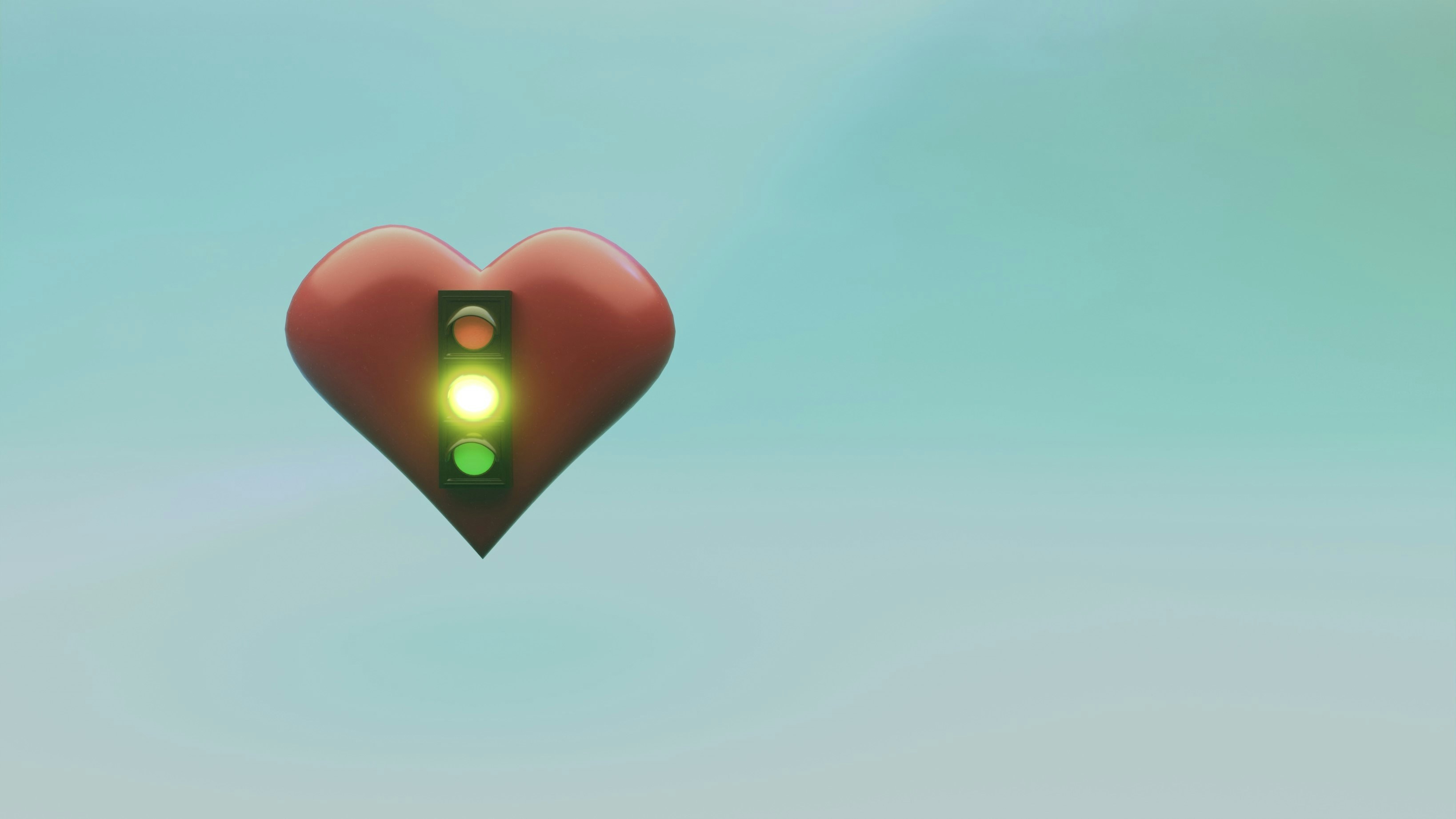 Corazón rojo con símbolo de semáforo verde sobre fondo azul.