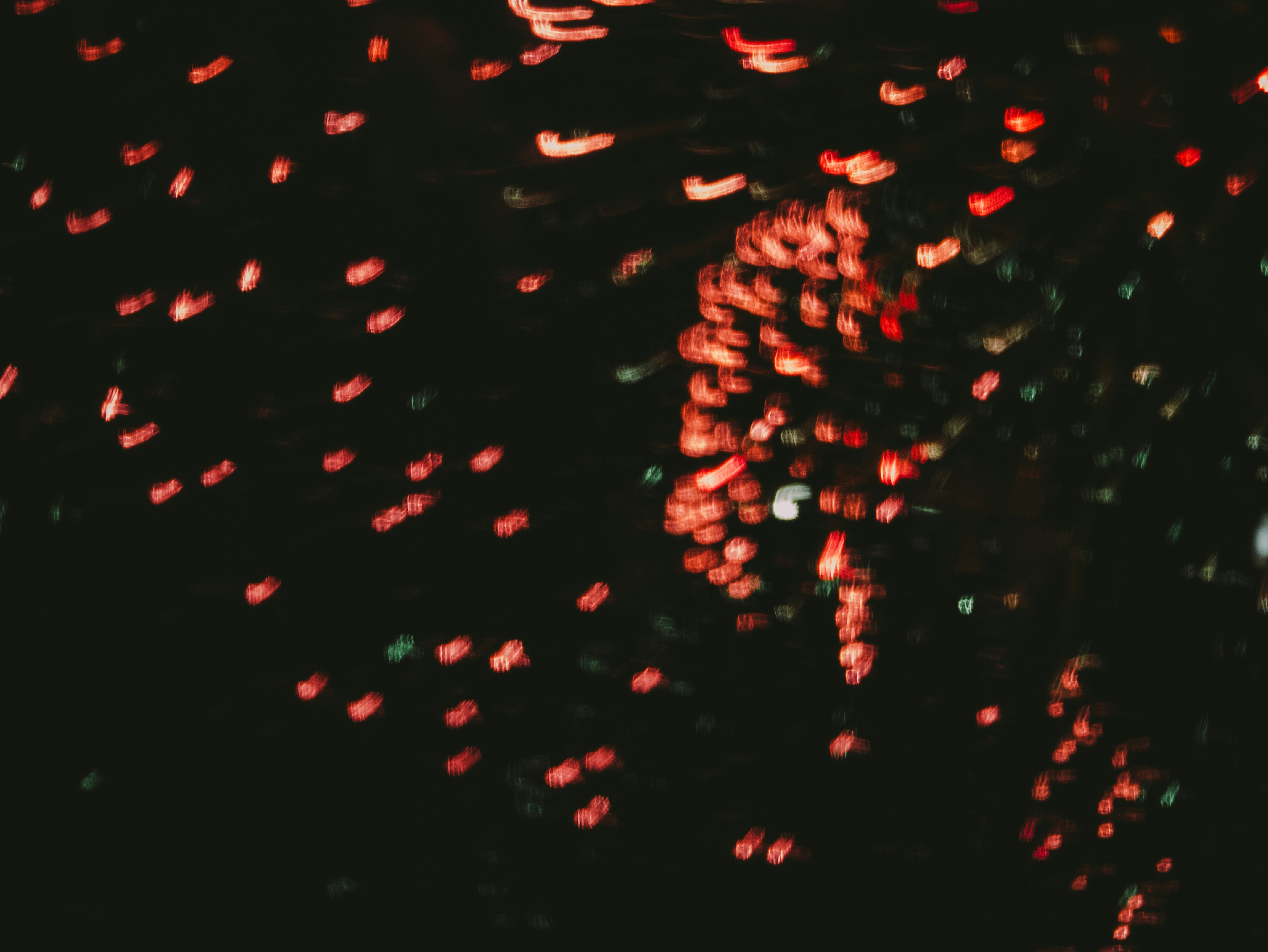 Dark Abstract Bokeh Of Red Lights Against A Dark Night. 4K Wallpaper #3622
