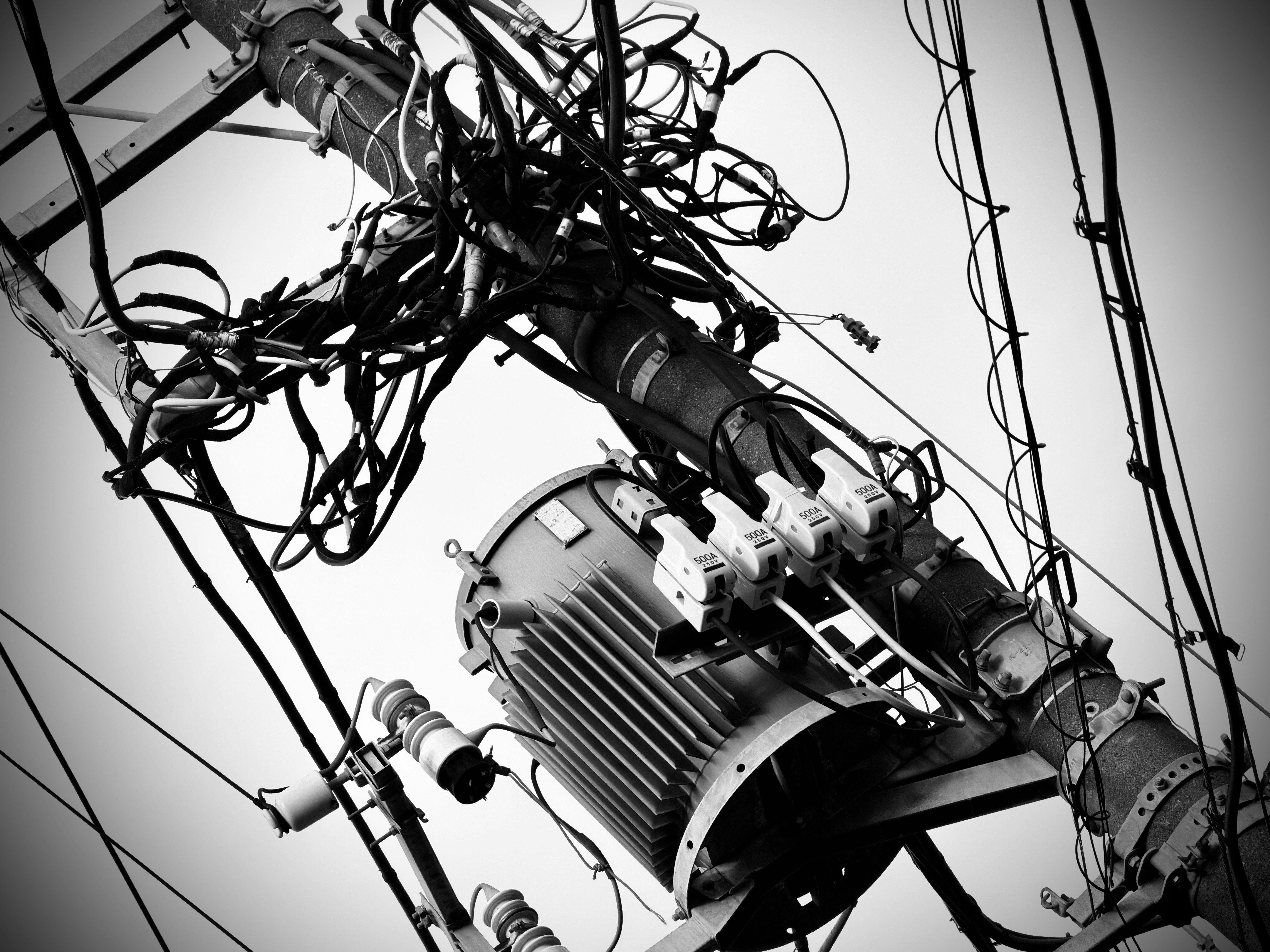 Technology Tangled Power Lines And A Transformer On A Utility Pole. 4K Wallpaper #3513