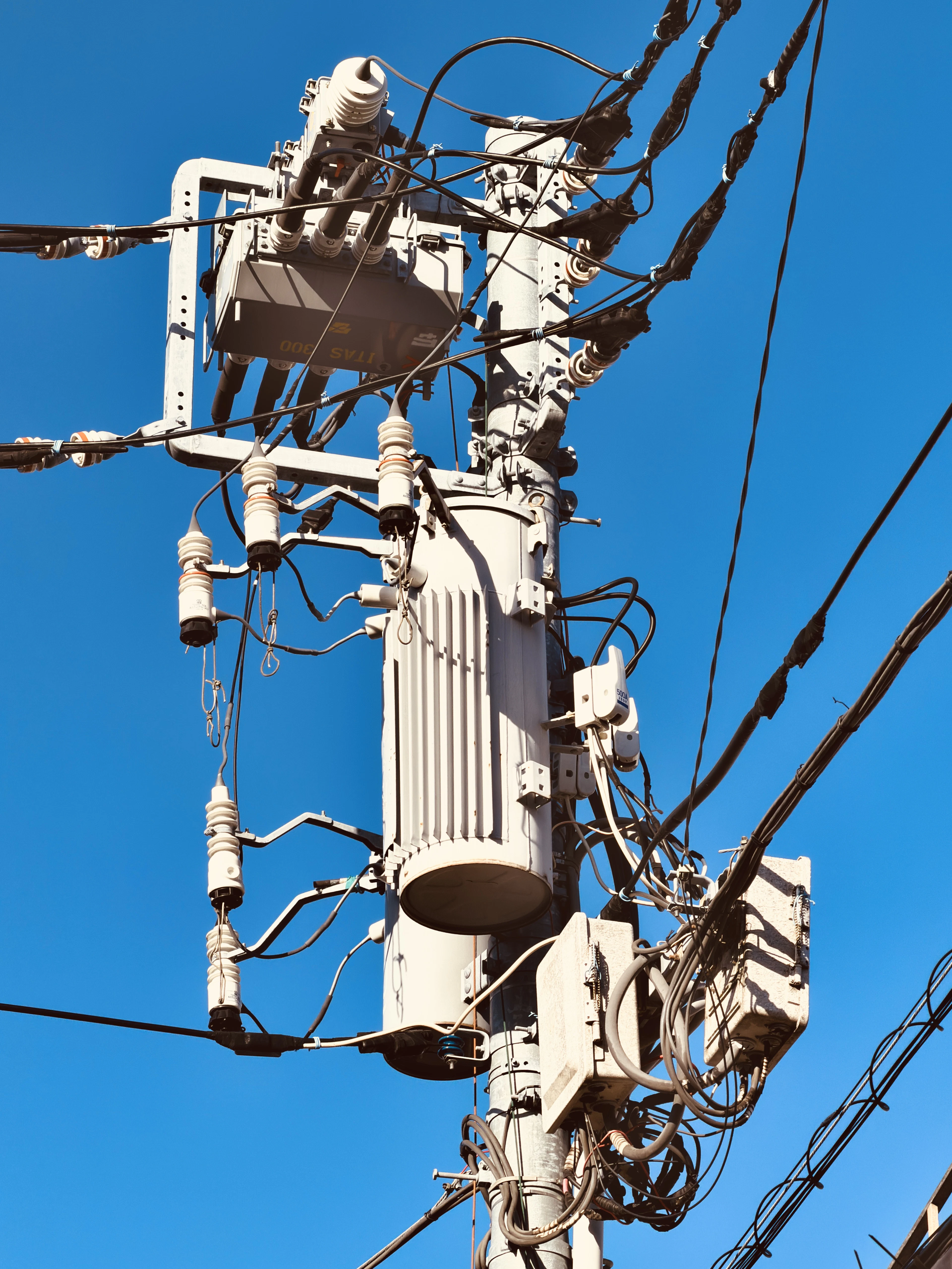 Distribution transformer mounted on a utility pole