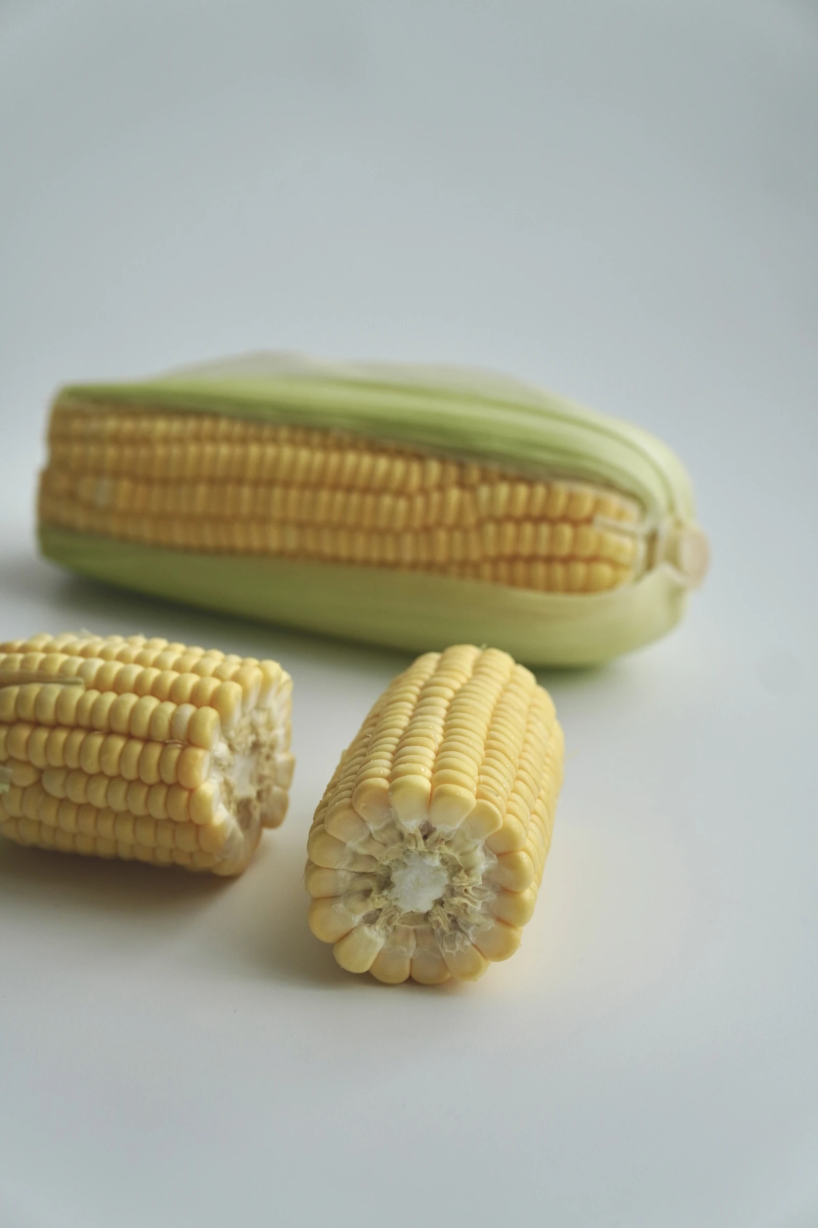 Fresh yellow corn cob and kernels