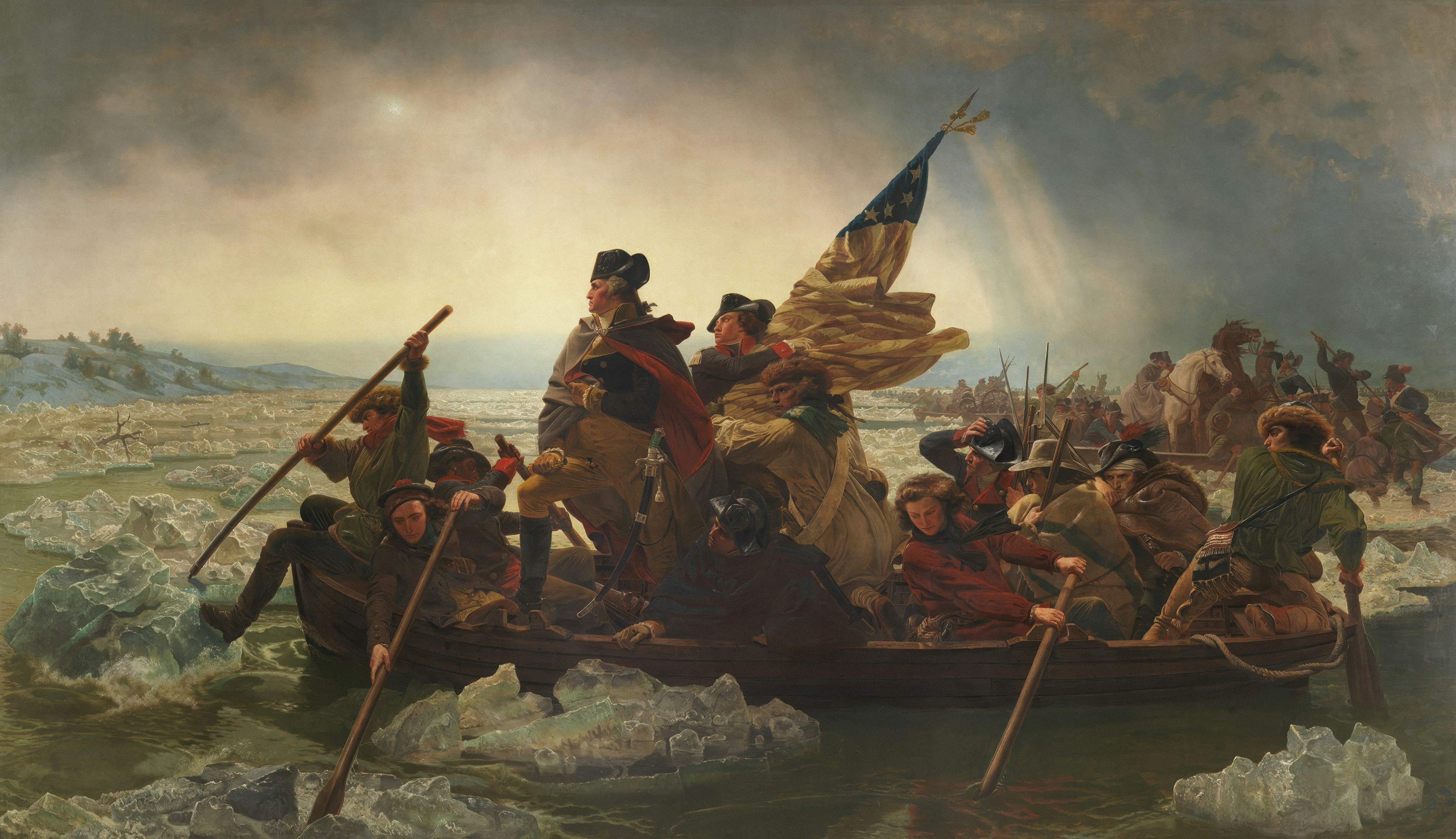 George washington leads soldiers across icy river in a boat
