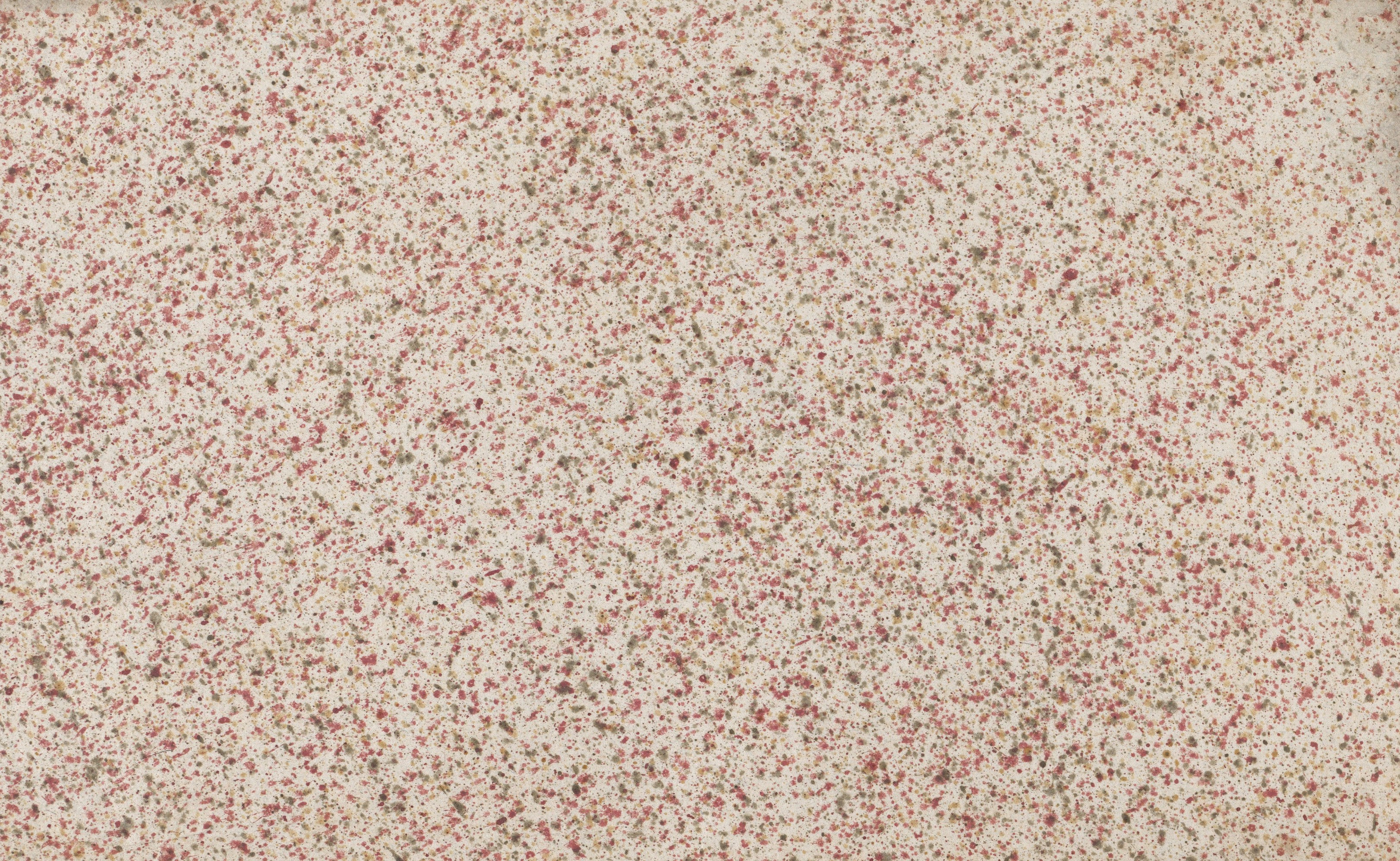 Cream stone with fine red and grey specks