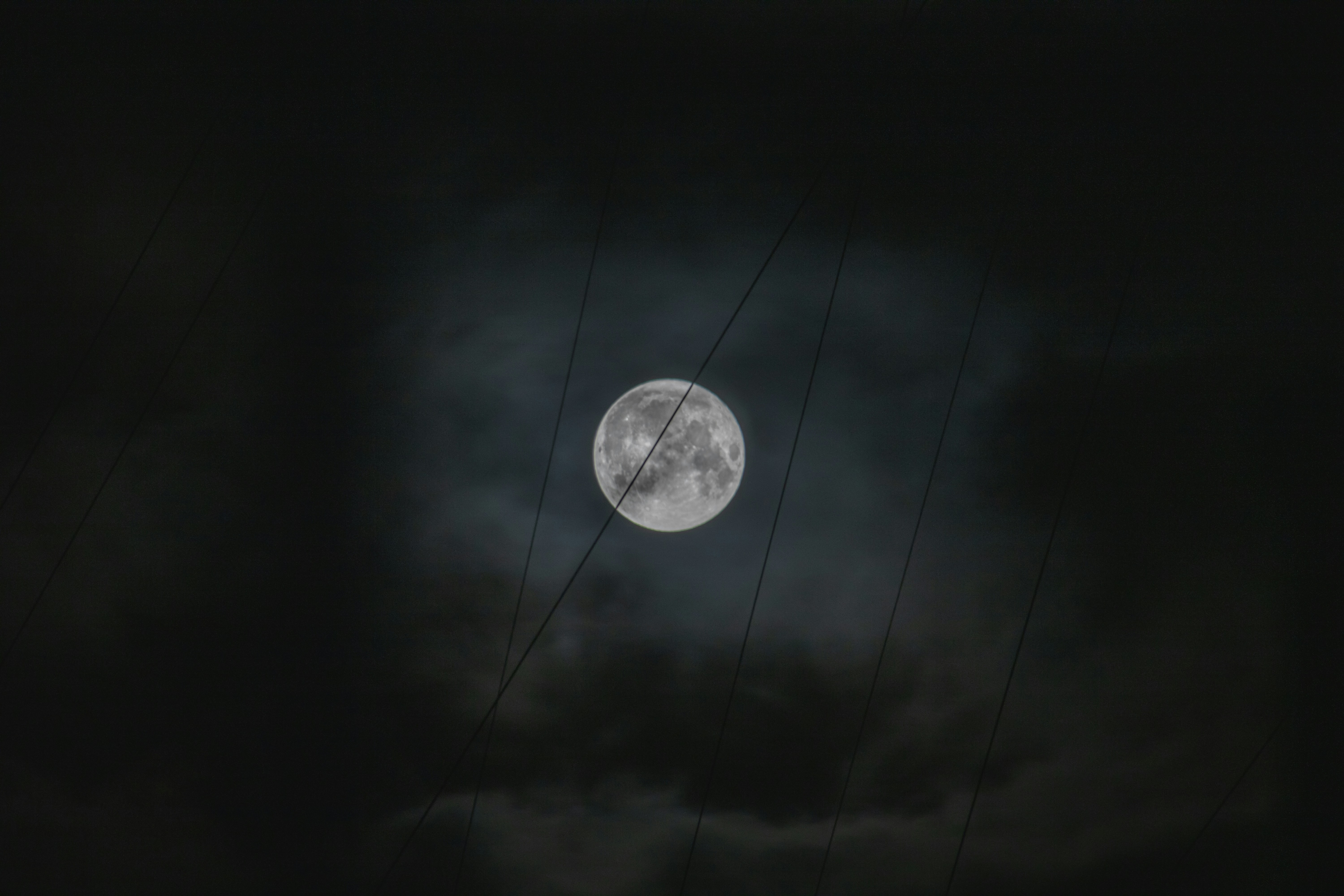 Dark The Moon Surrounded By Clouds At Night, Viewed Through A Window 4K Wallpaper #3612