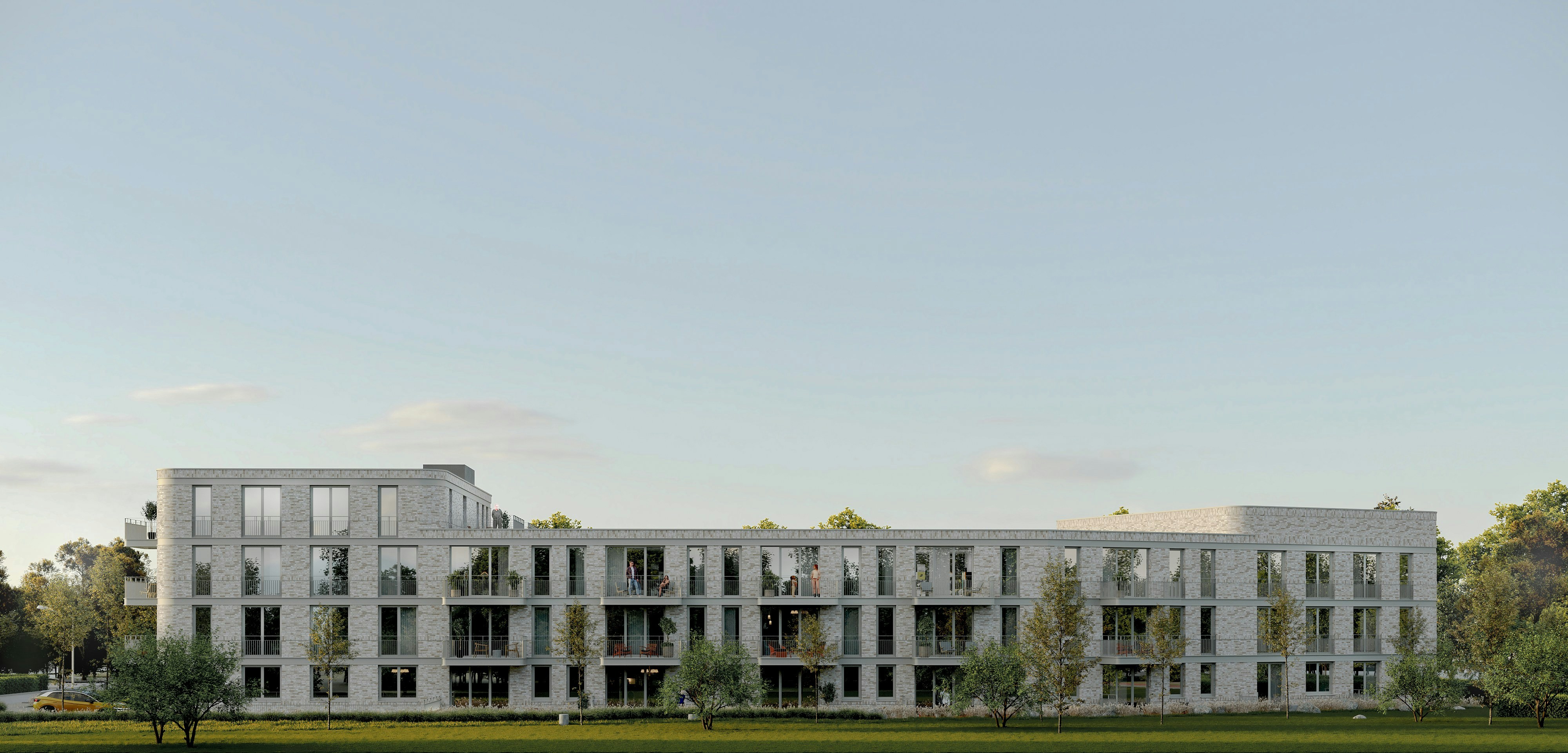 Modern residential building with balconies, surrounded by green trees.