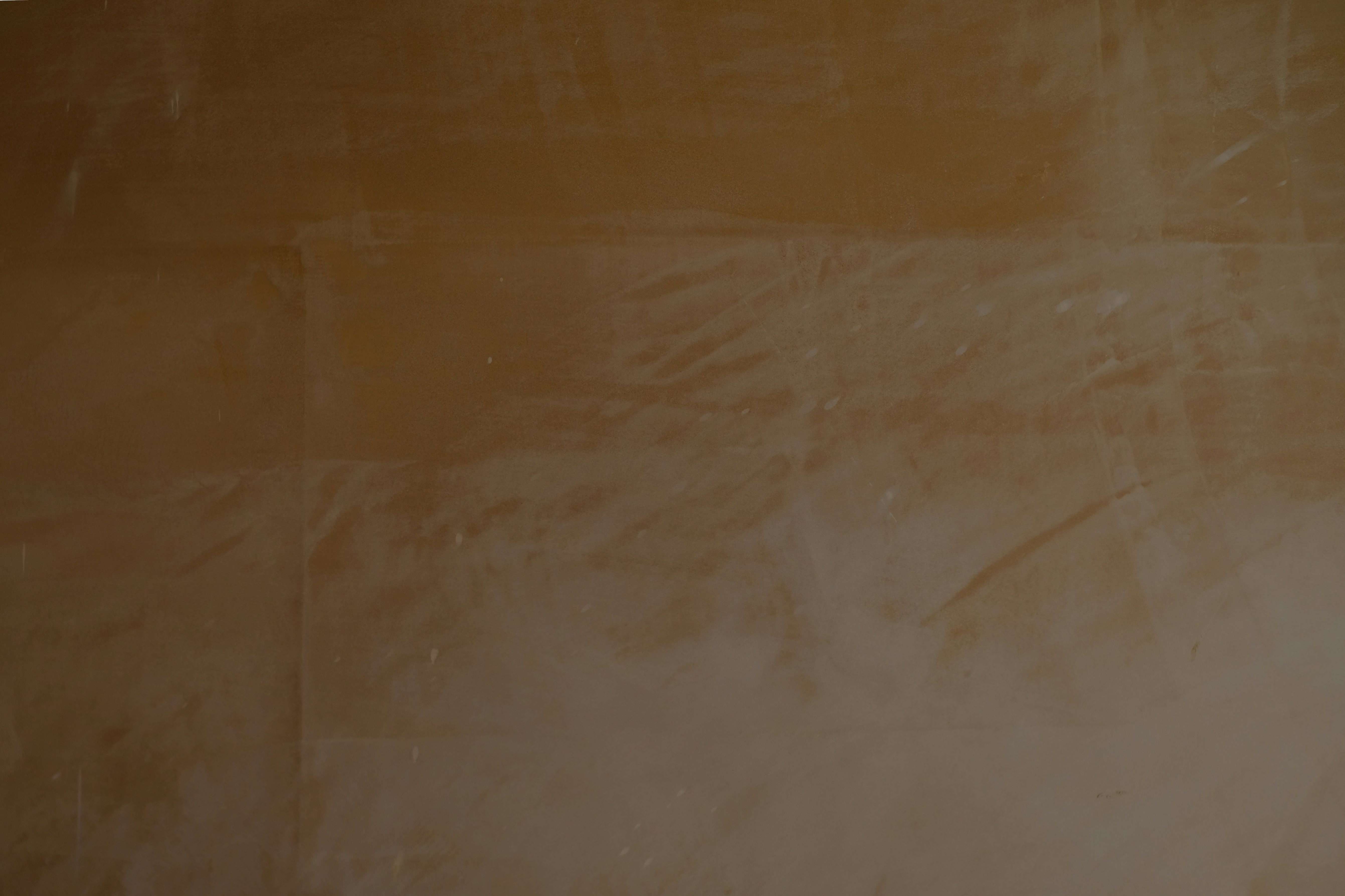 A warm brown textured surface