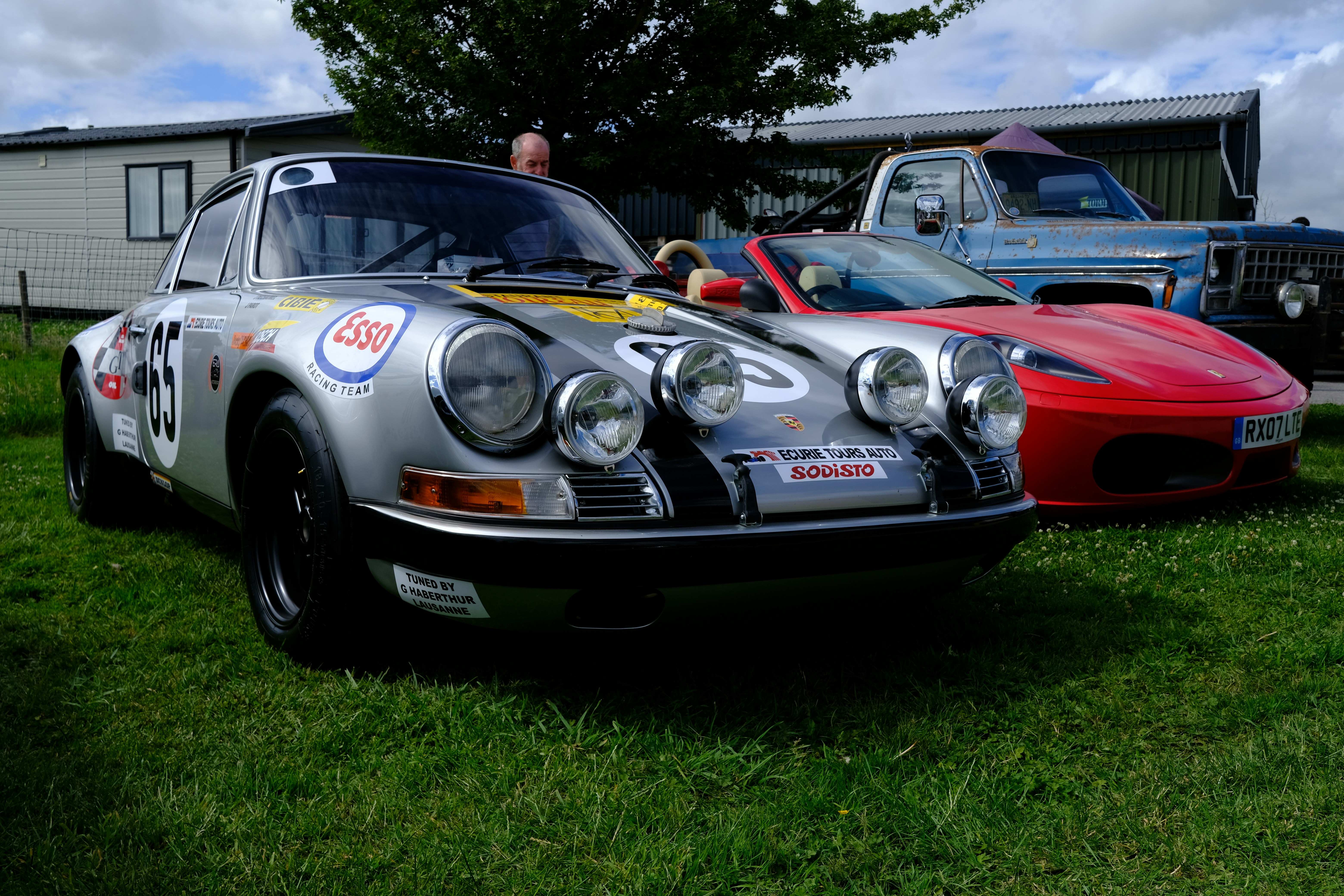 Cars Classic Silver Rally Car Parked On Grass With Other Vehicles. 4K Wallpaper #3499
