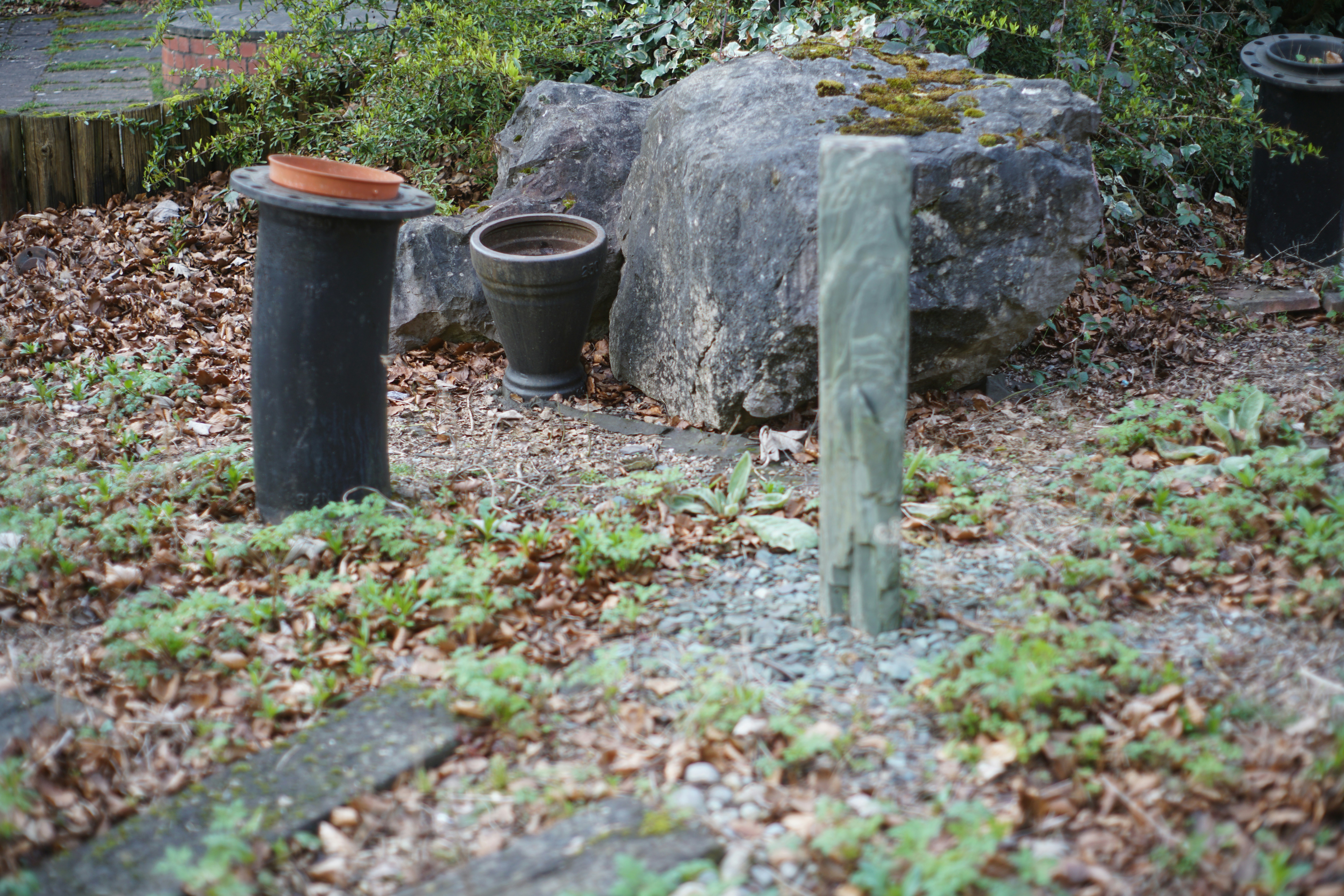 Space Decorative Garden Features Including Stone Pillars, Rock, And Pottery. 4K Wallpaper #3522