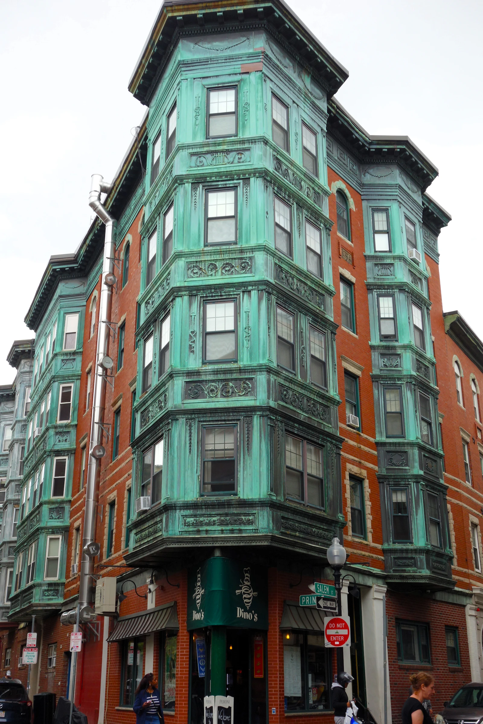 Classic Boston-area triple-decker with bay windows