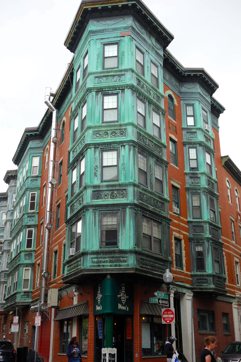 Classic Boston-area triple-decker with bay windows