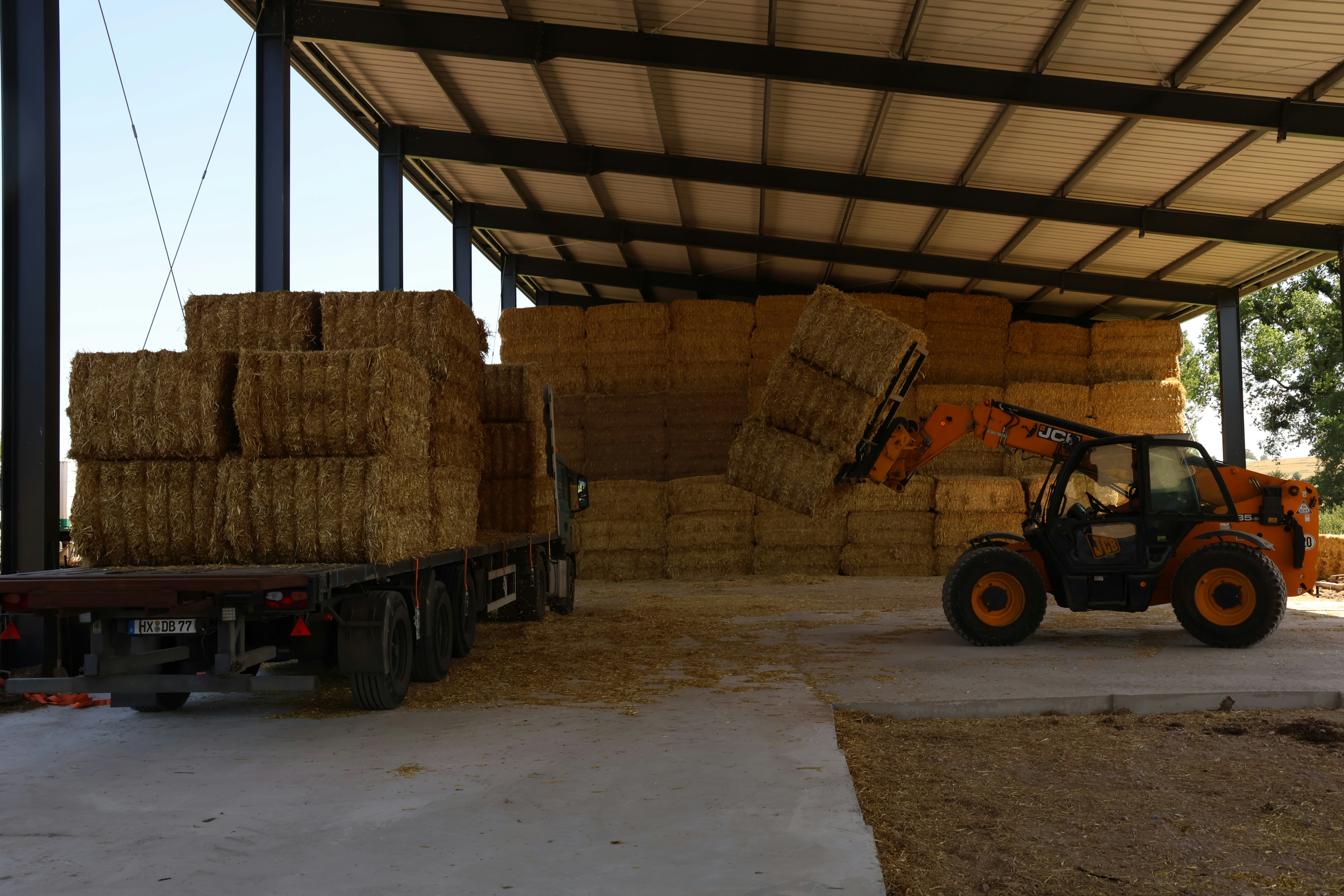 Equipment loaded on a heavy duty flatbed deck