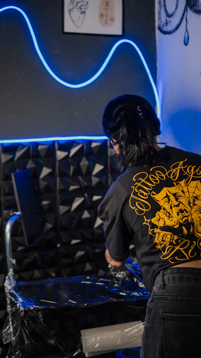 Akar tattoo studio interior with neon lighting