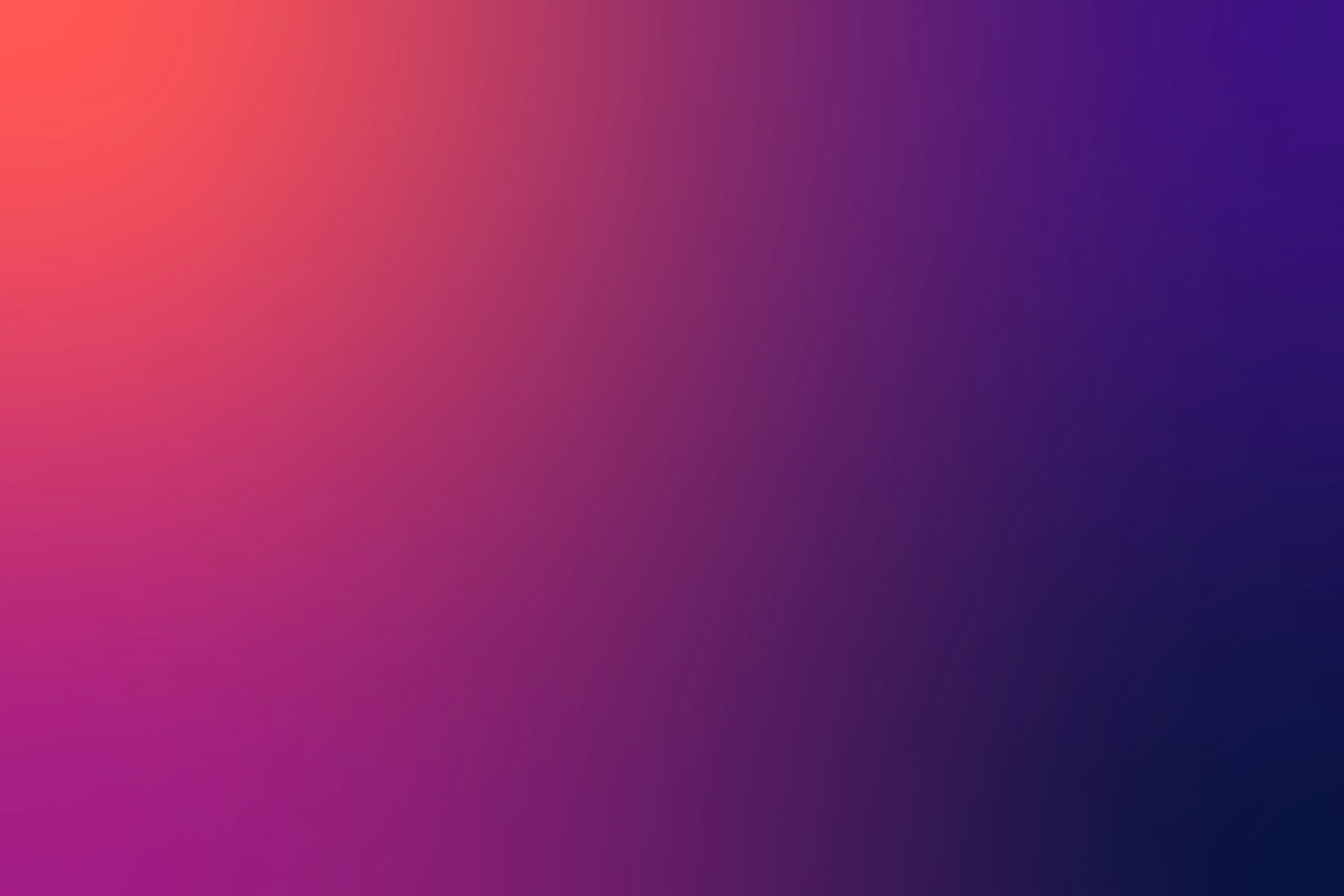 A smooth gradient background from red to purple