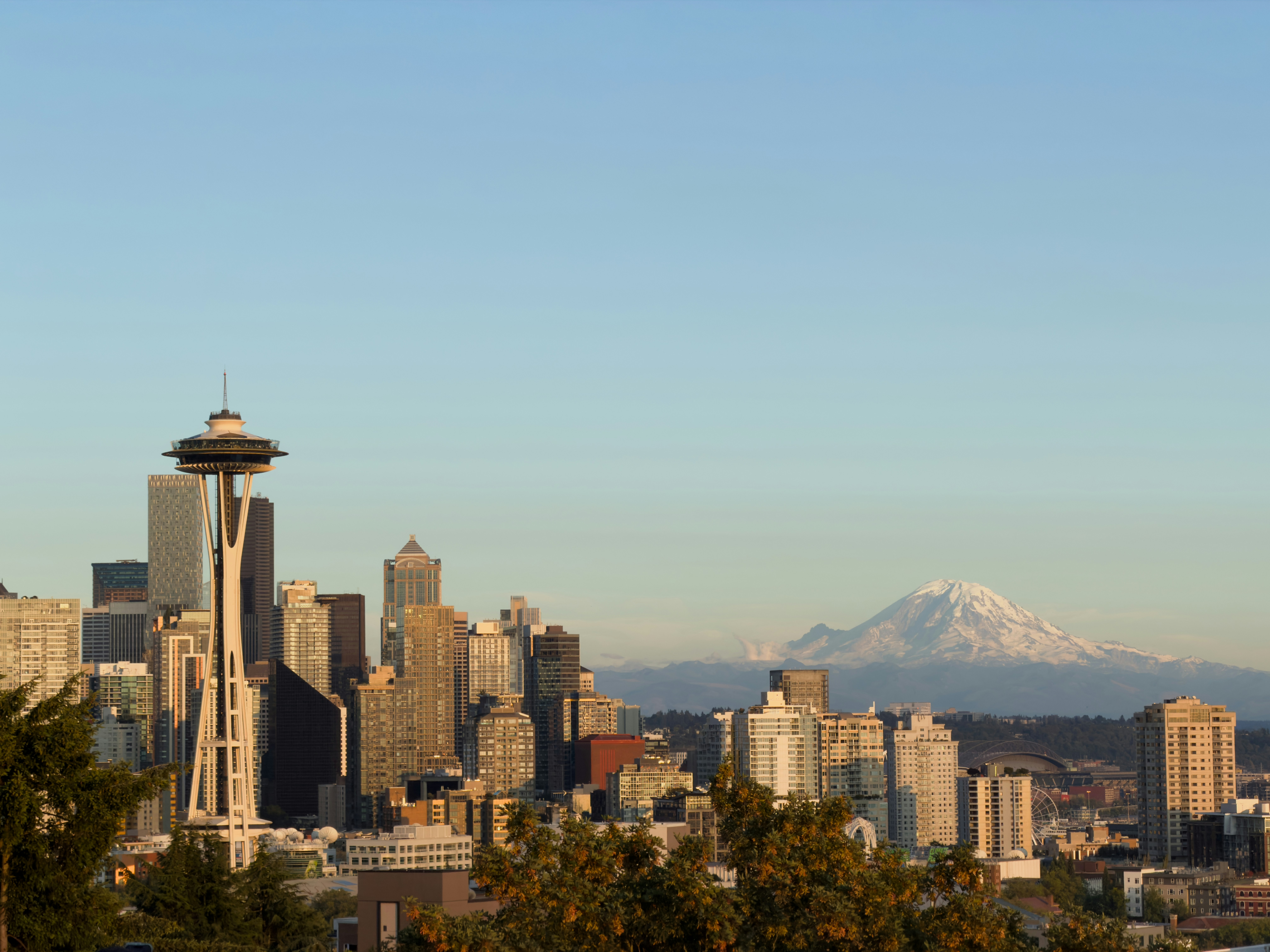 Cityscape of seattle with space needle and mount rainier
