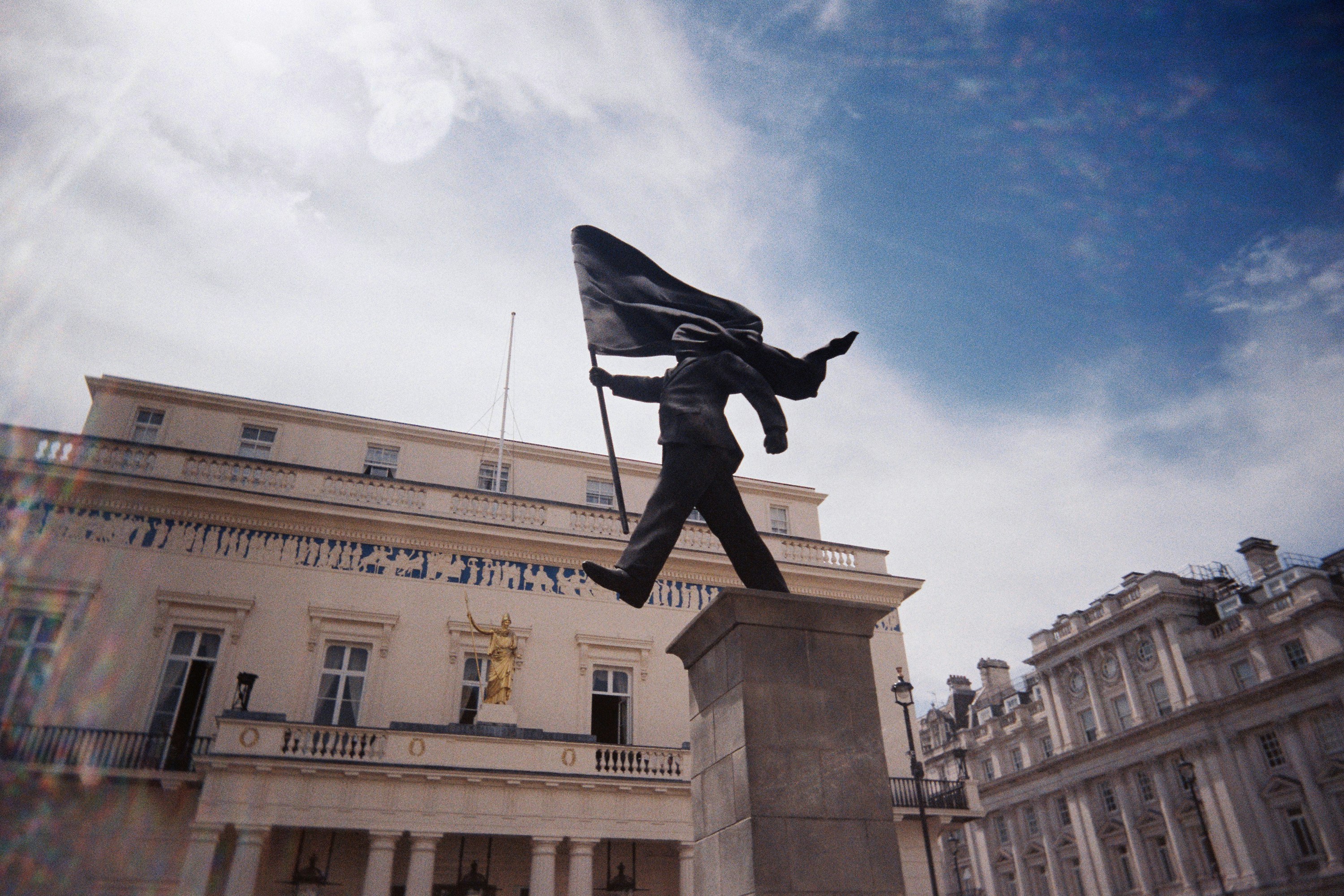 Blinded by the flag statue by banksy in london