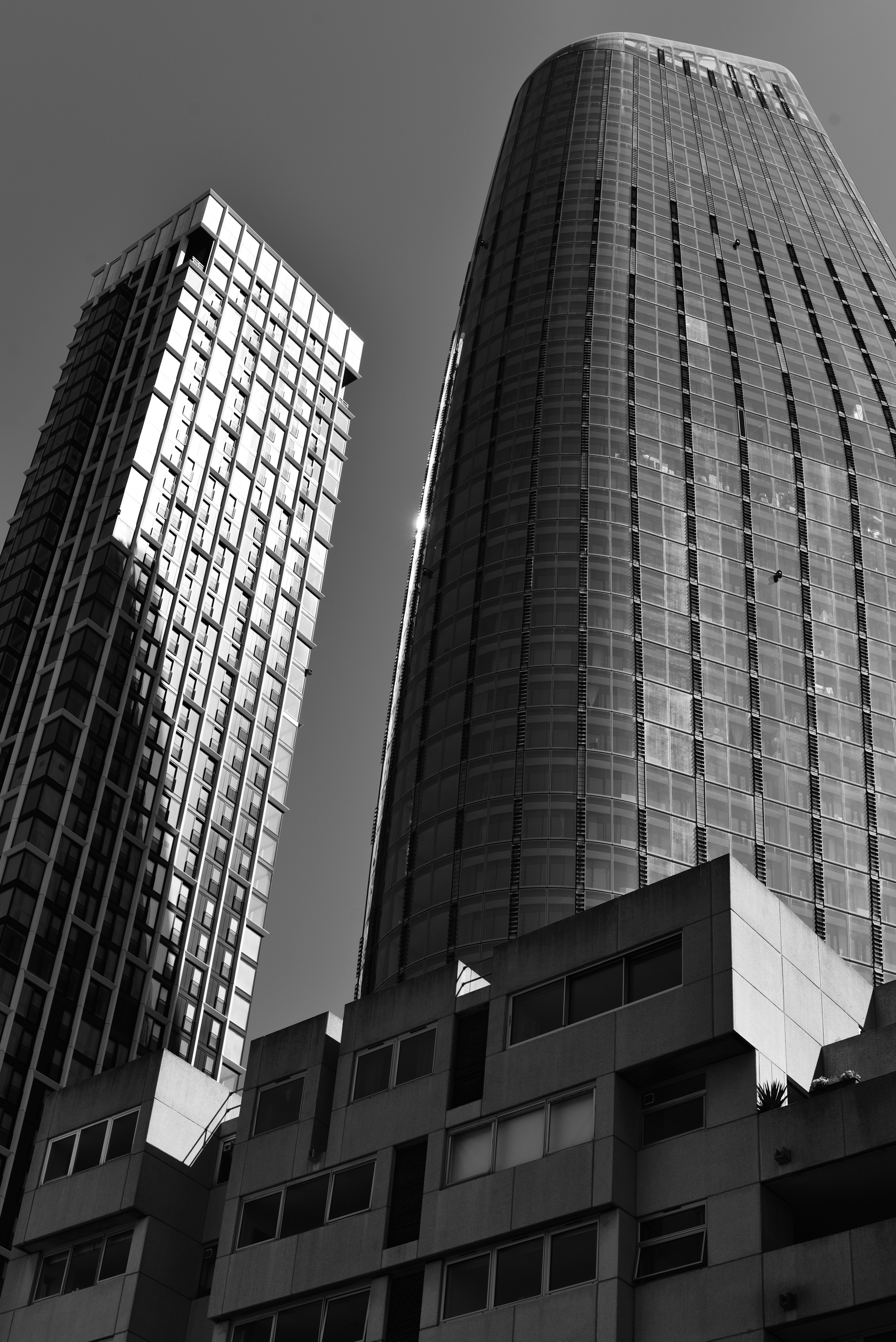 Monochrome city skyline with modern and brutalist architecture