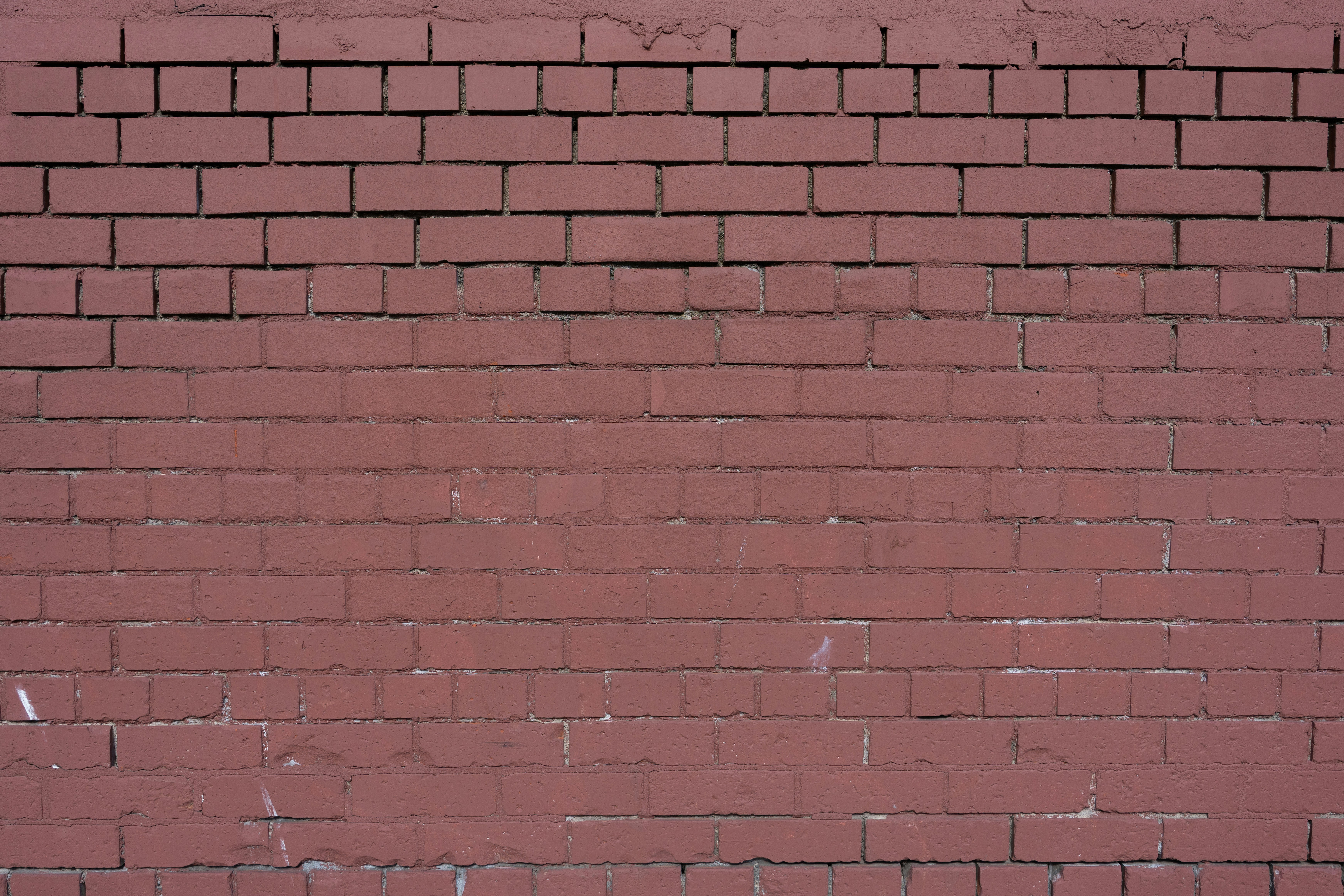Painted red brick wall texture