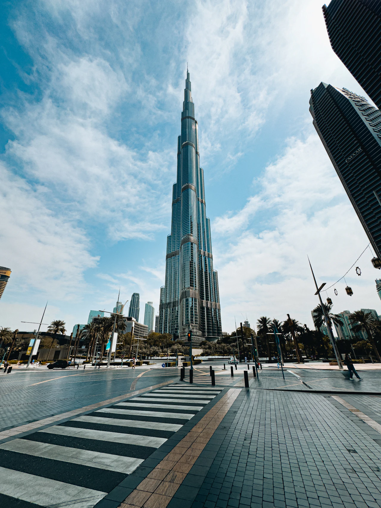 Looking up at Burj Khalifa from the plaza below on a sunny day