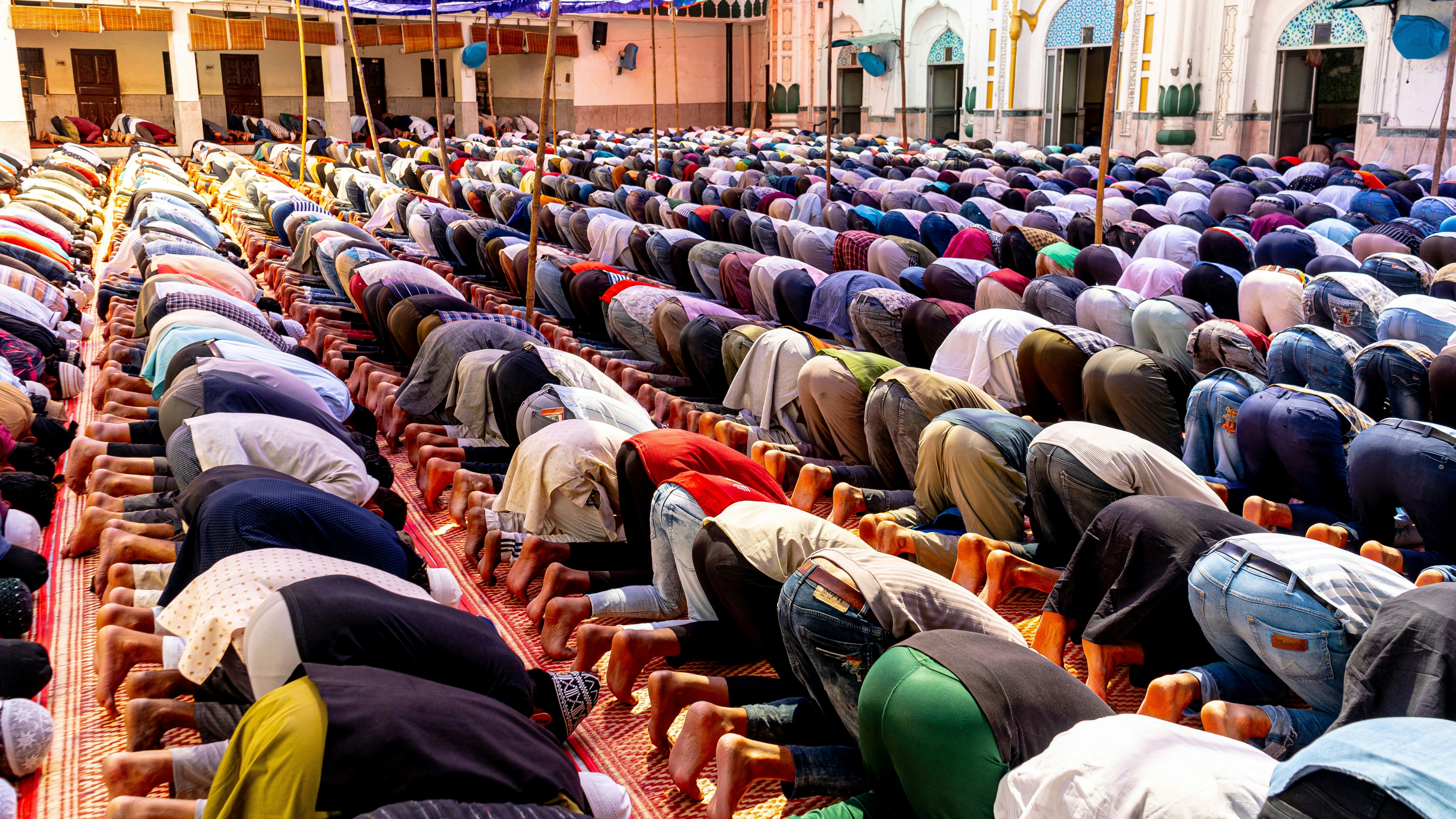 Muslim congregation praying together in a mosque