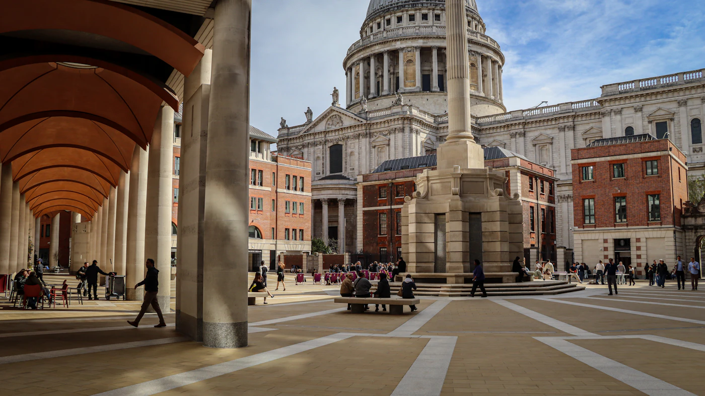 Paternoster Square in London, with its stone column and arcade in front of the dome of St. Paul’s Cathedral